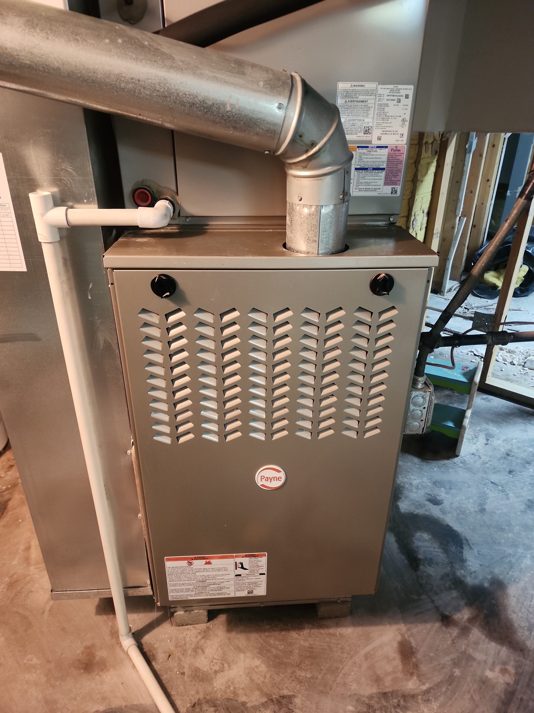 Payne furnace serviced in a basement