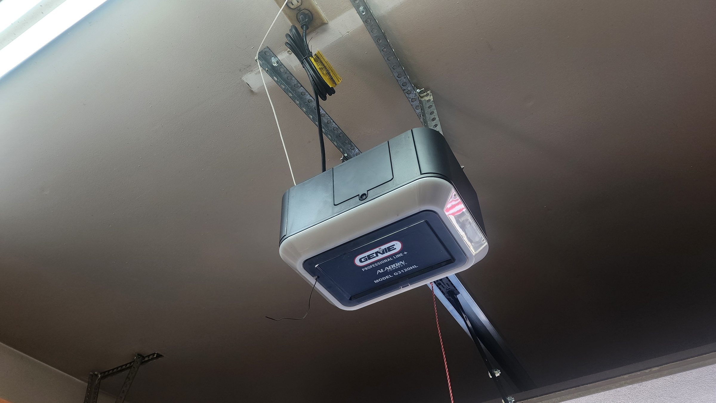 Genie opener installed on a garage ceiling