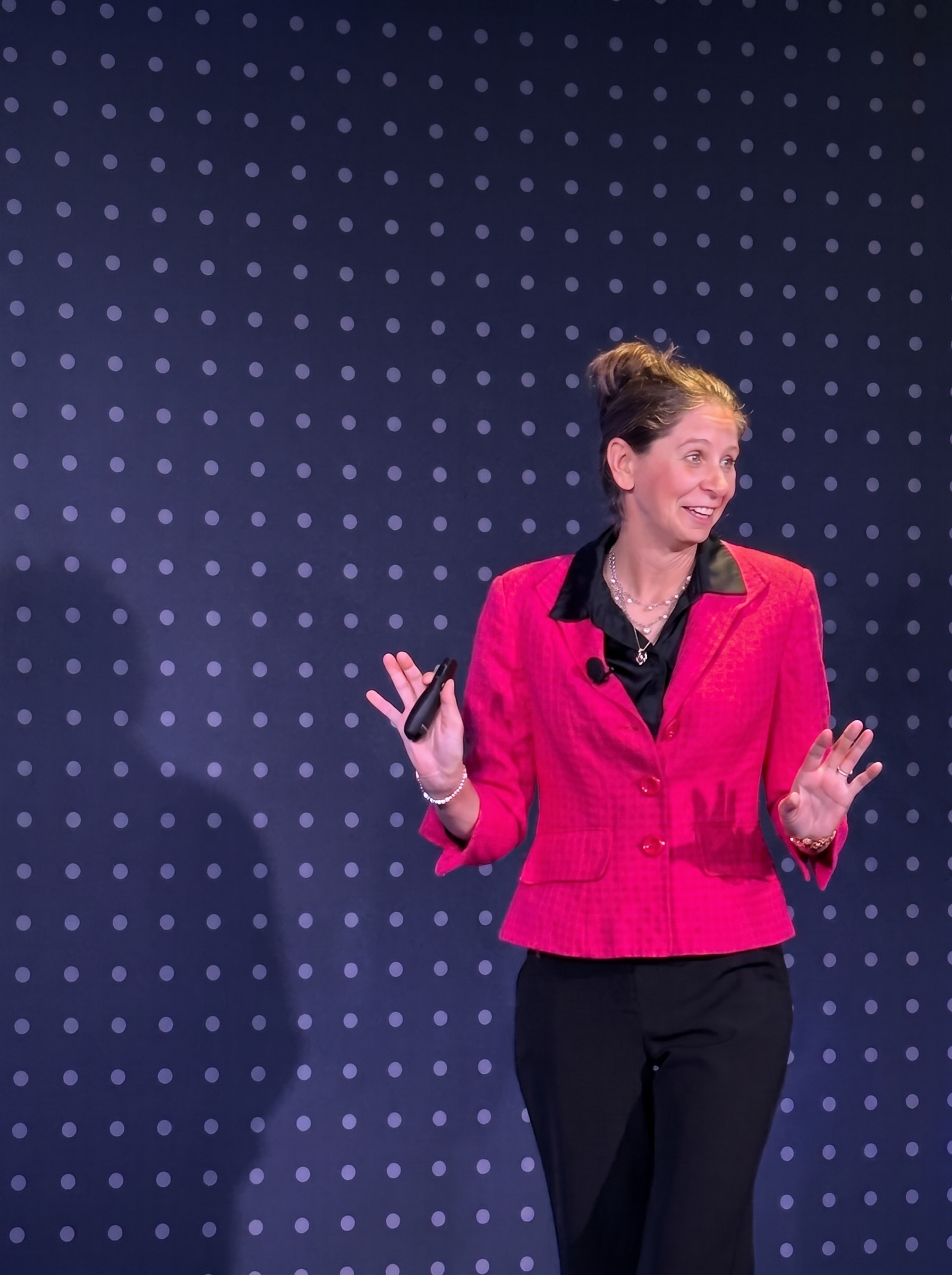 Jennifer Bennett speaking on stage