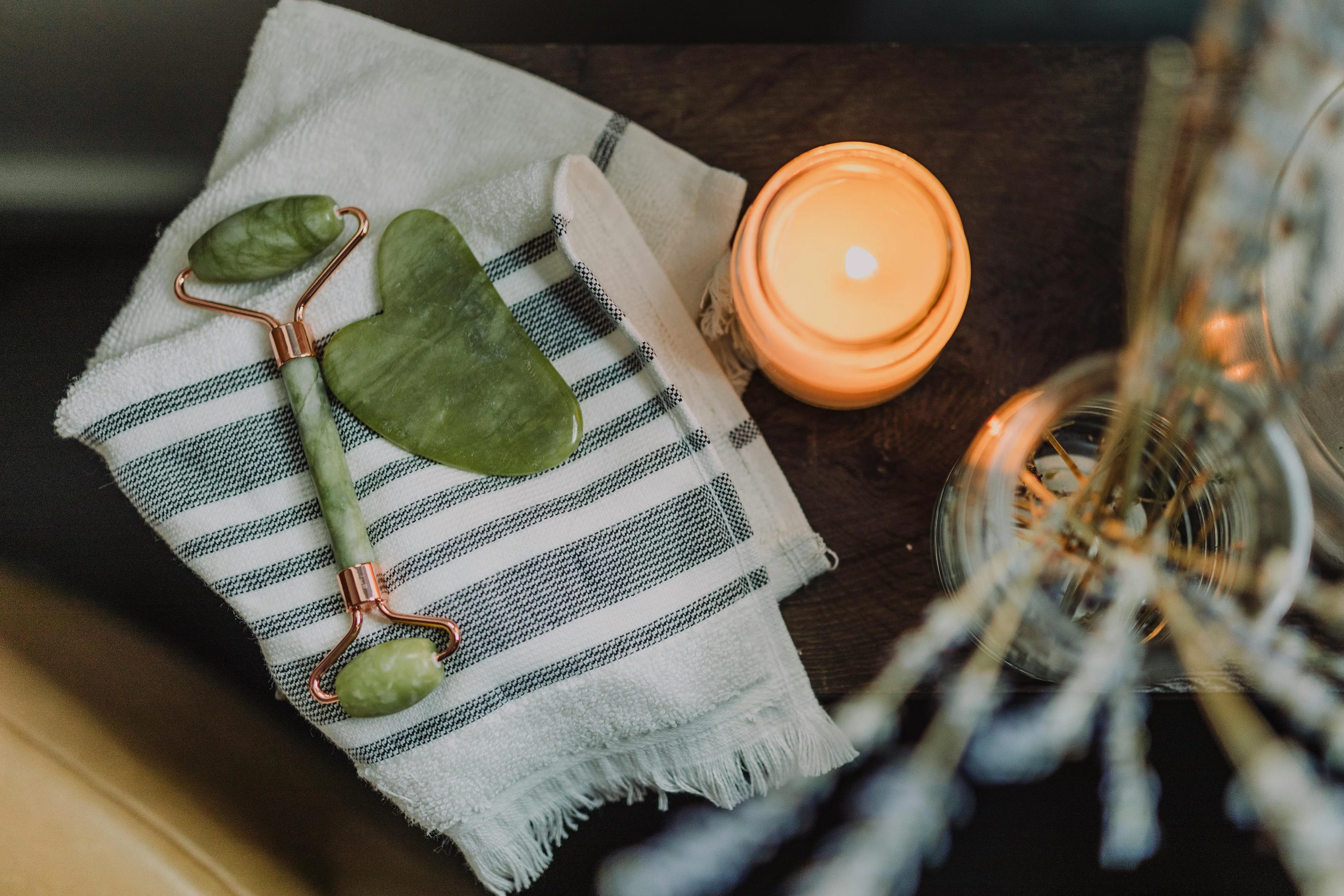Gua sha stone and facial oil for masterclass event