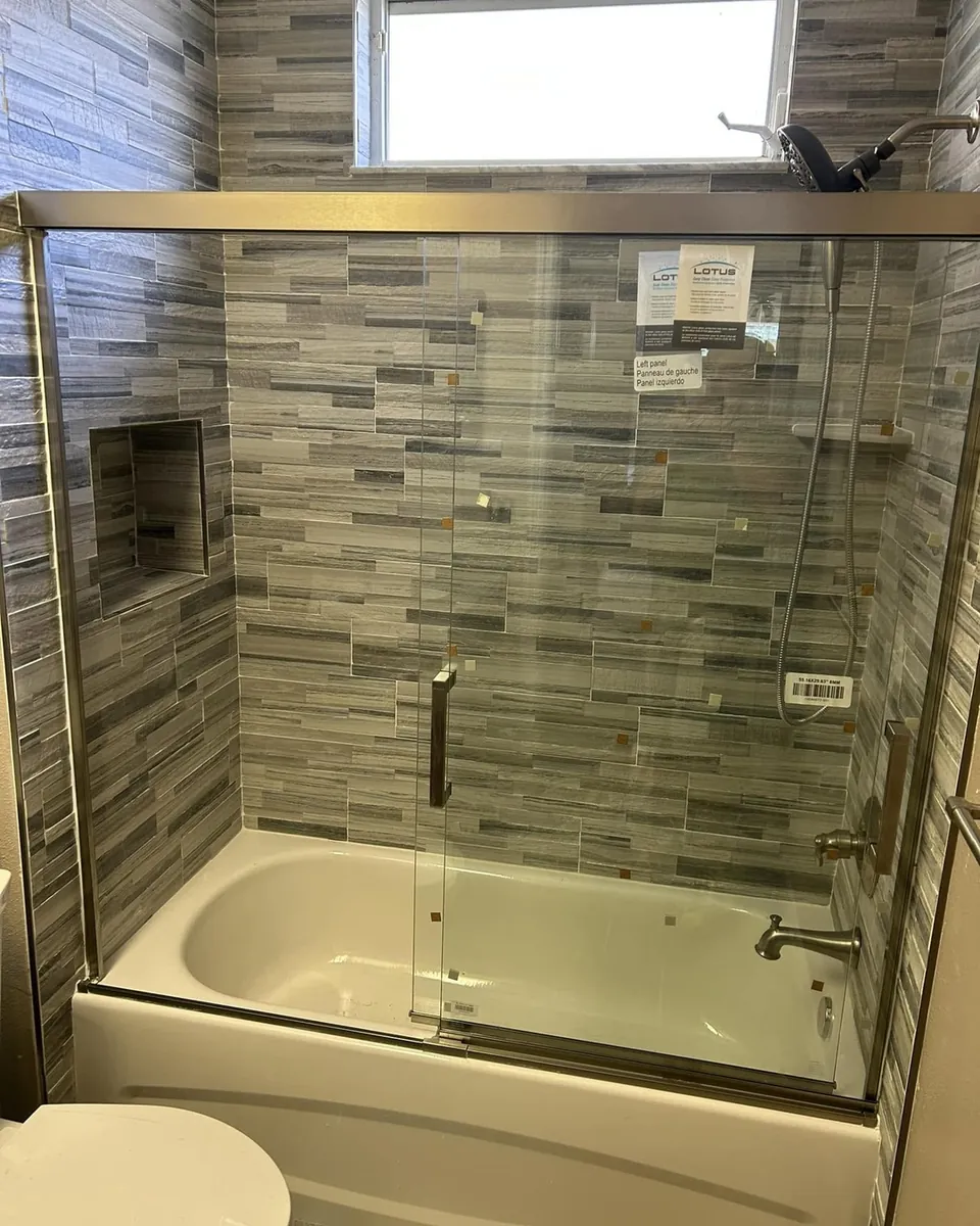 Linear mosaic tub and shower surround