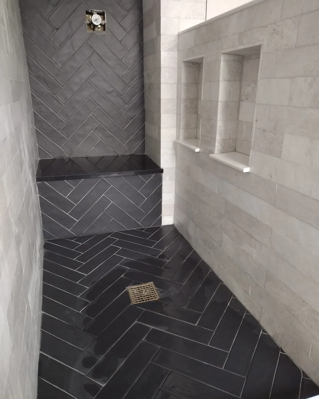 Herringbone walk-in shower tile by T-L Ceramic Installation LLC in Lakeland, FL
