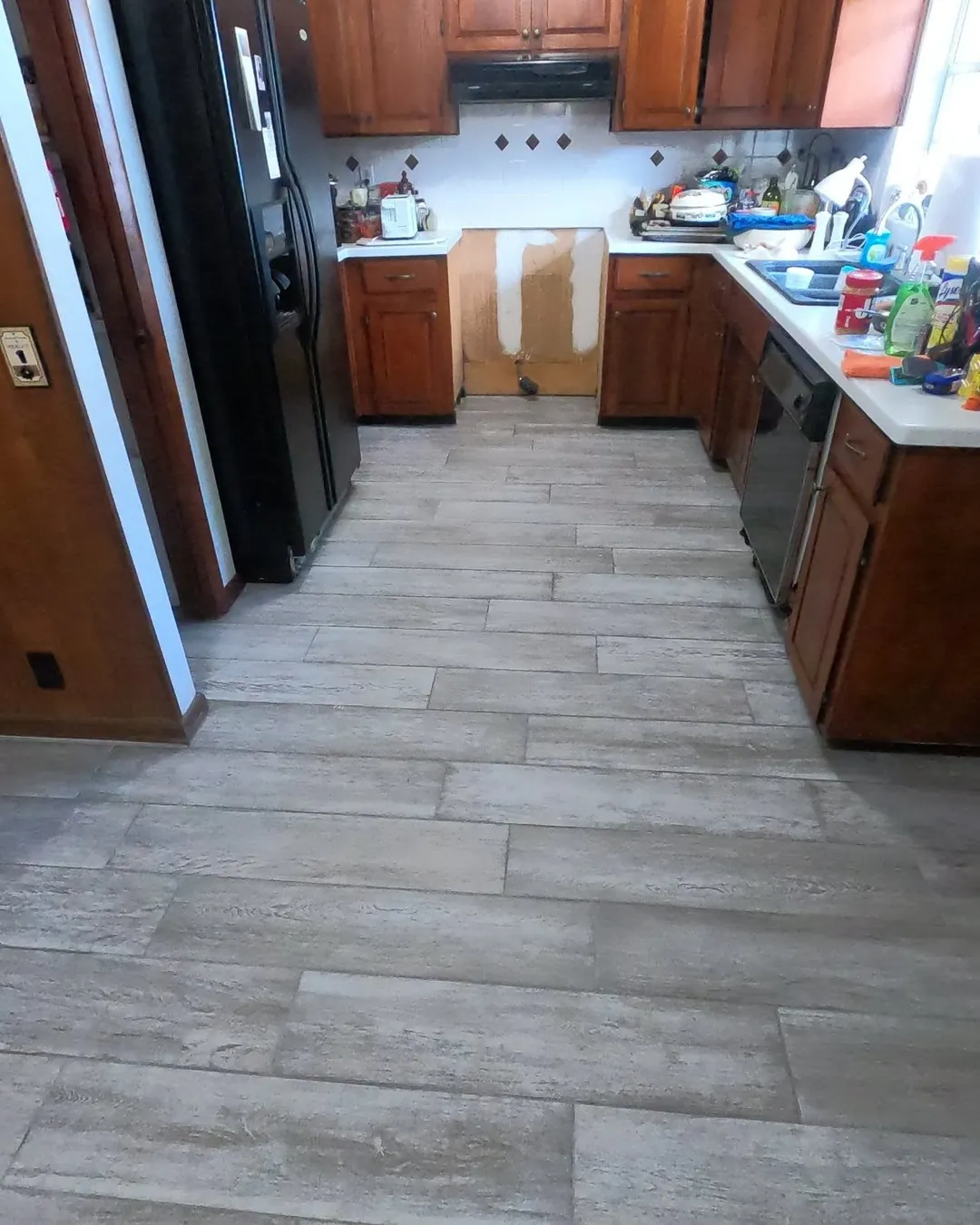 Wood-look tile flooring installed by T-L Ceramic Installation LLC in Lakeland, FL