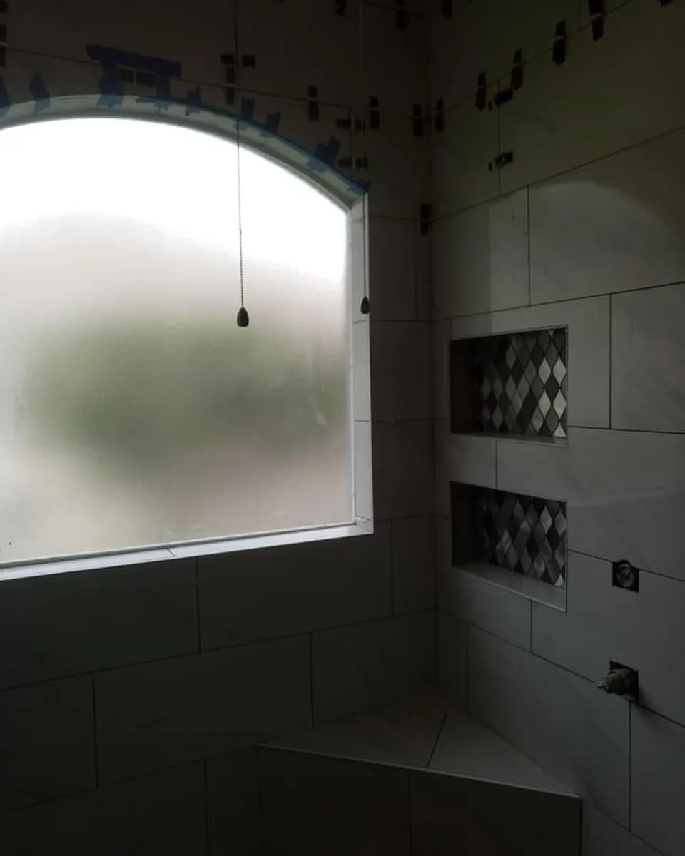 Marble shower niches and corner bench