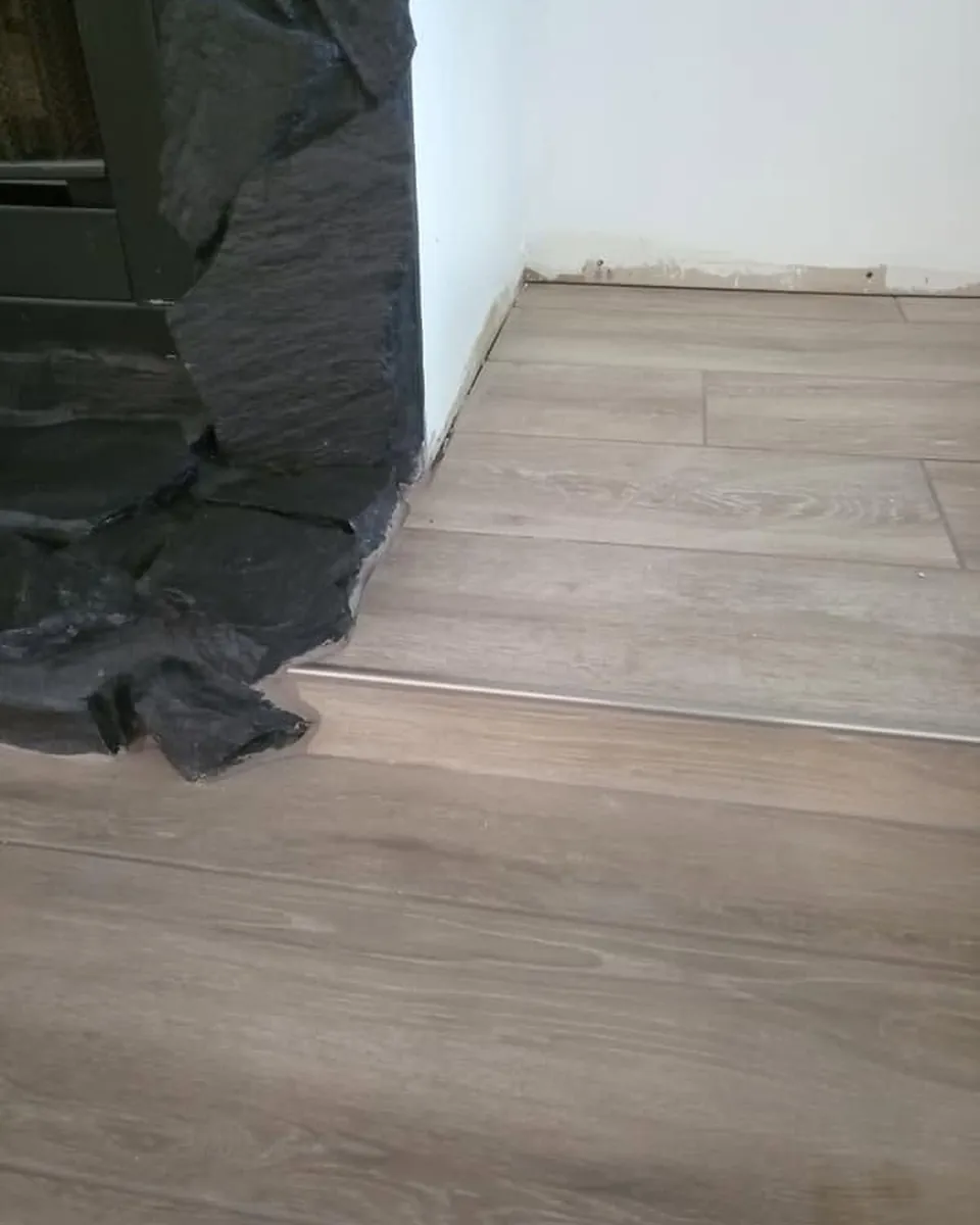 Precision hearth cut in wood-look flooring