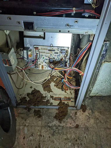 Dirty furnace interior before cleaning