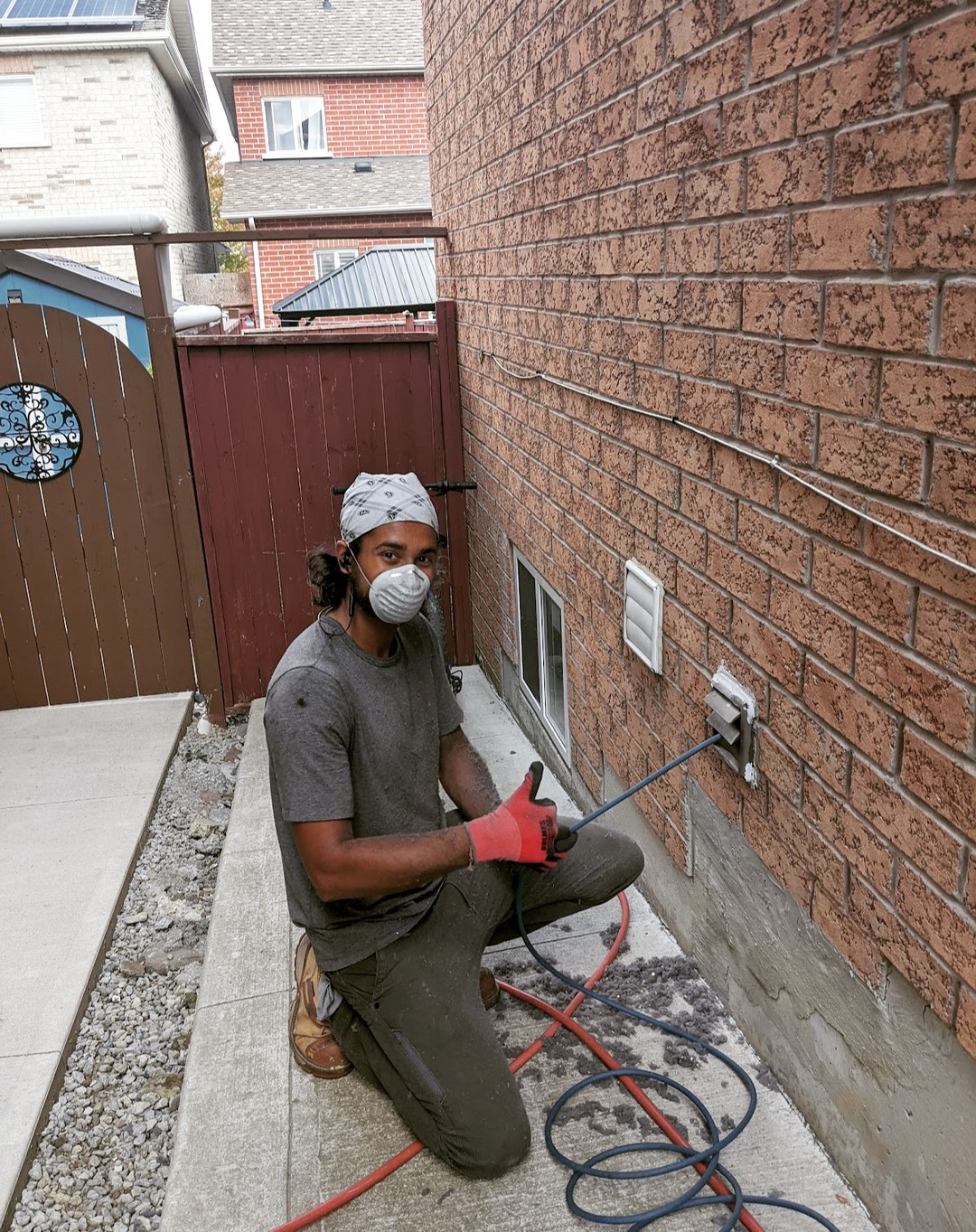 Breathe Well technician cleaning a home duct system