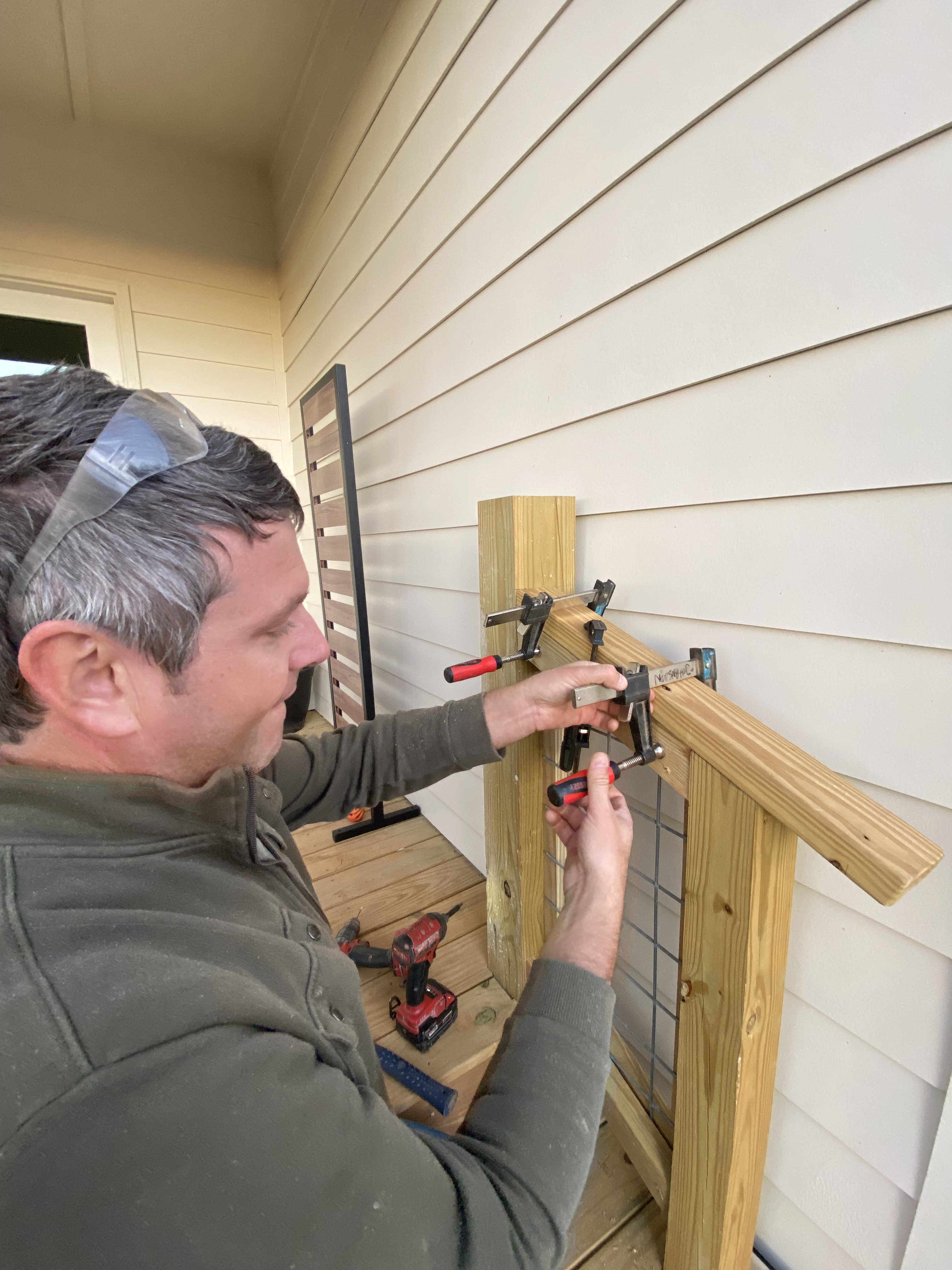 Joakim Johansson completing detailed installation work at a home