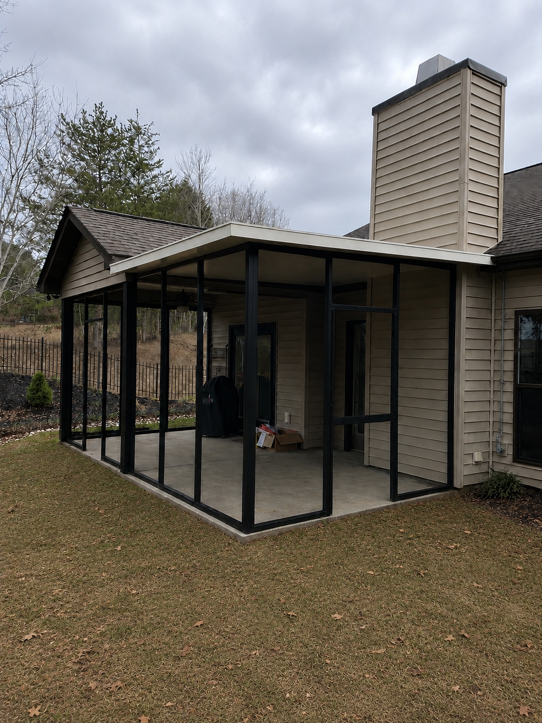 Tirrell porch expansion under construction showing the new framing beside the existing covered area