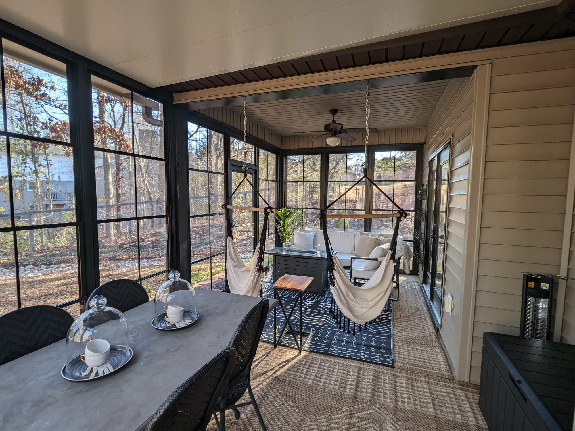 Finished expanded Eze-Breeze outdoor room with dining and seating space in Berea, South Carolina