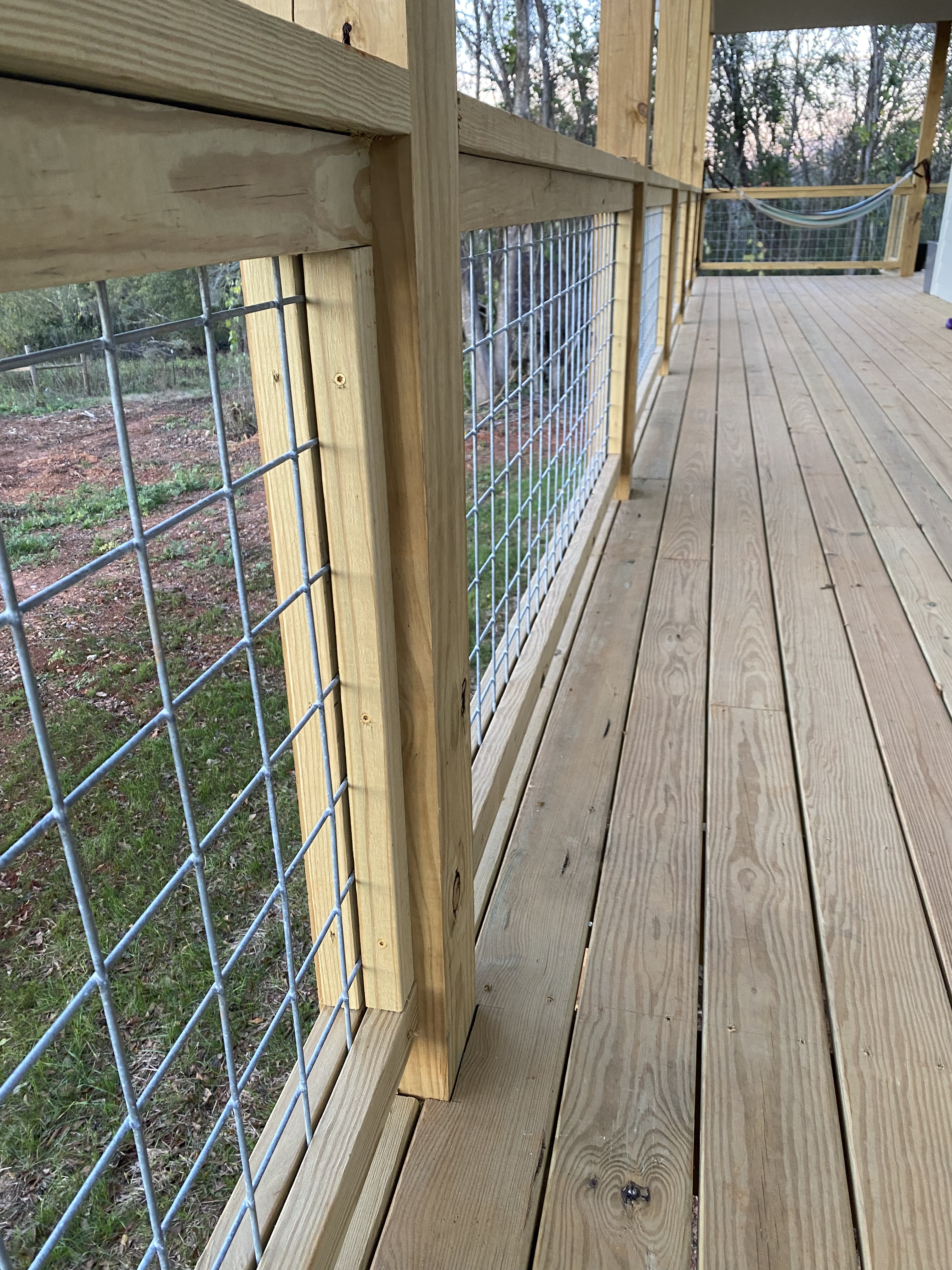 Close detail of hog-wire railing on the Ryan porch near Easley
