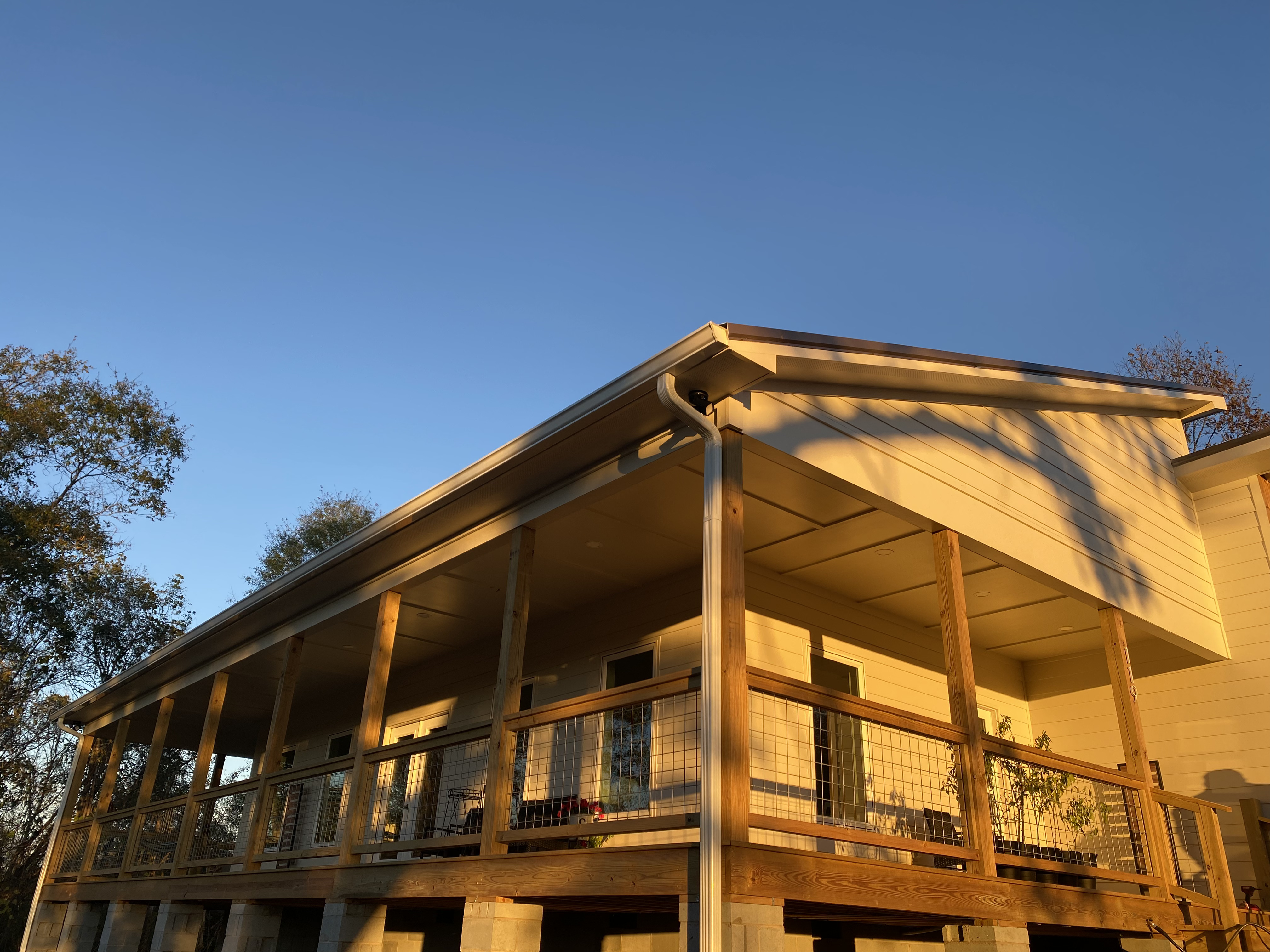 Wide finished exterior view of the Ryan covered porch and home in the Easley area