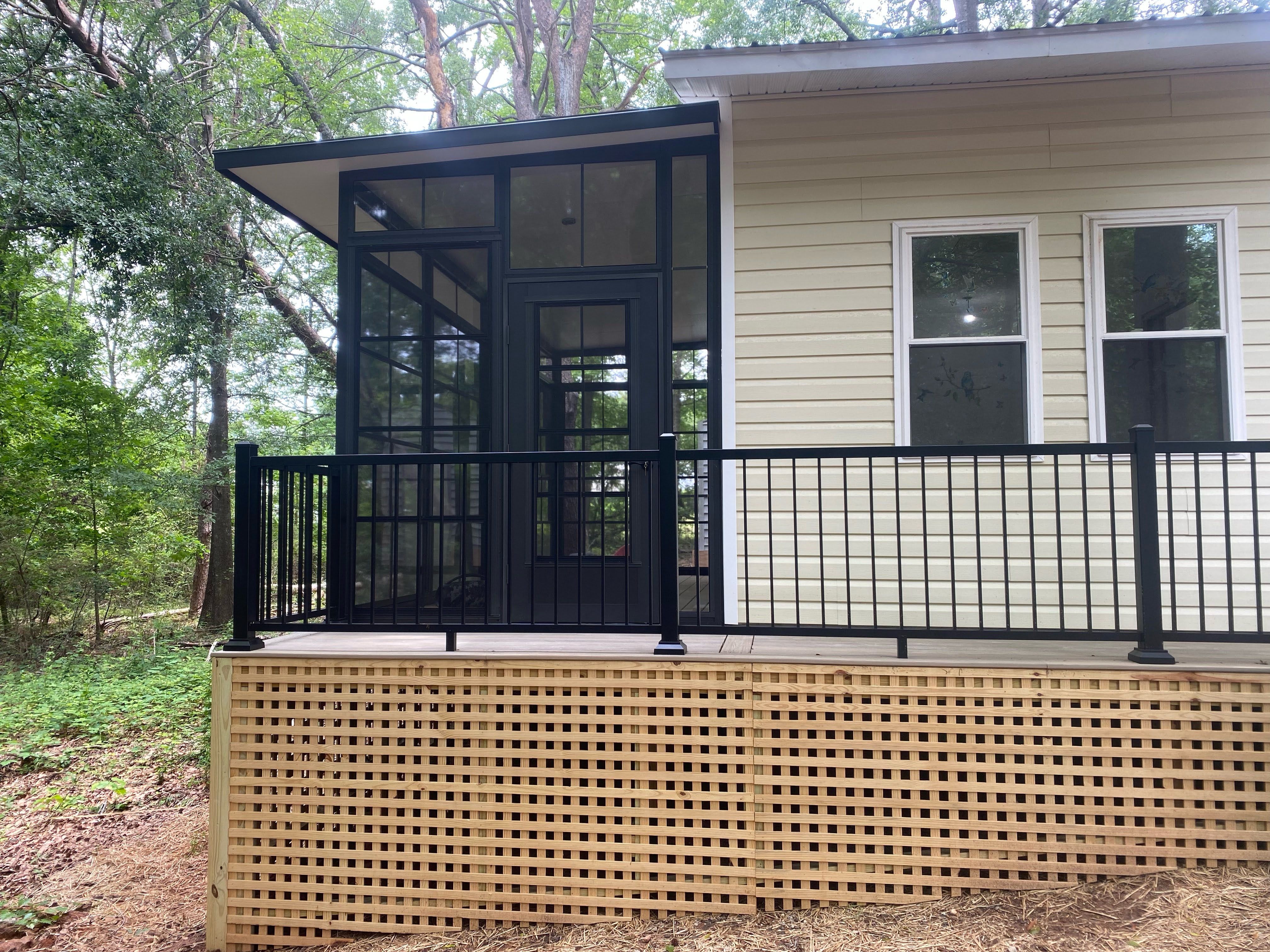Finished gable and side view of the Greenville Eze-Breeze porch and deck