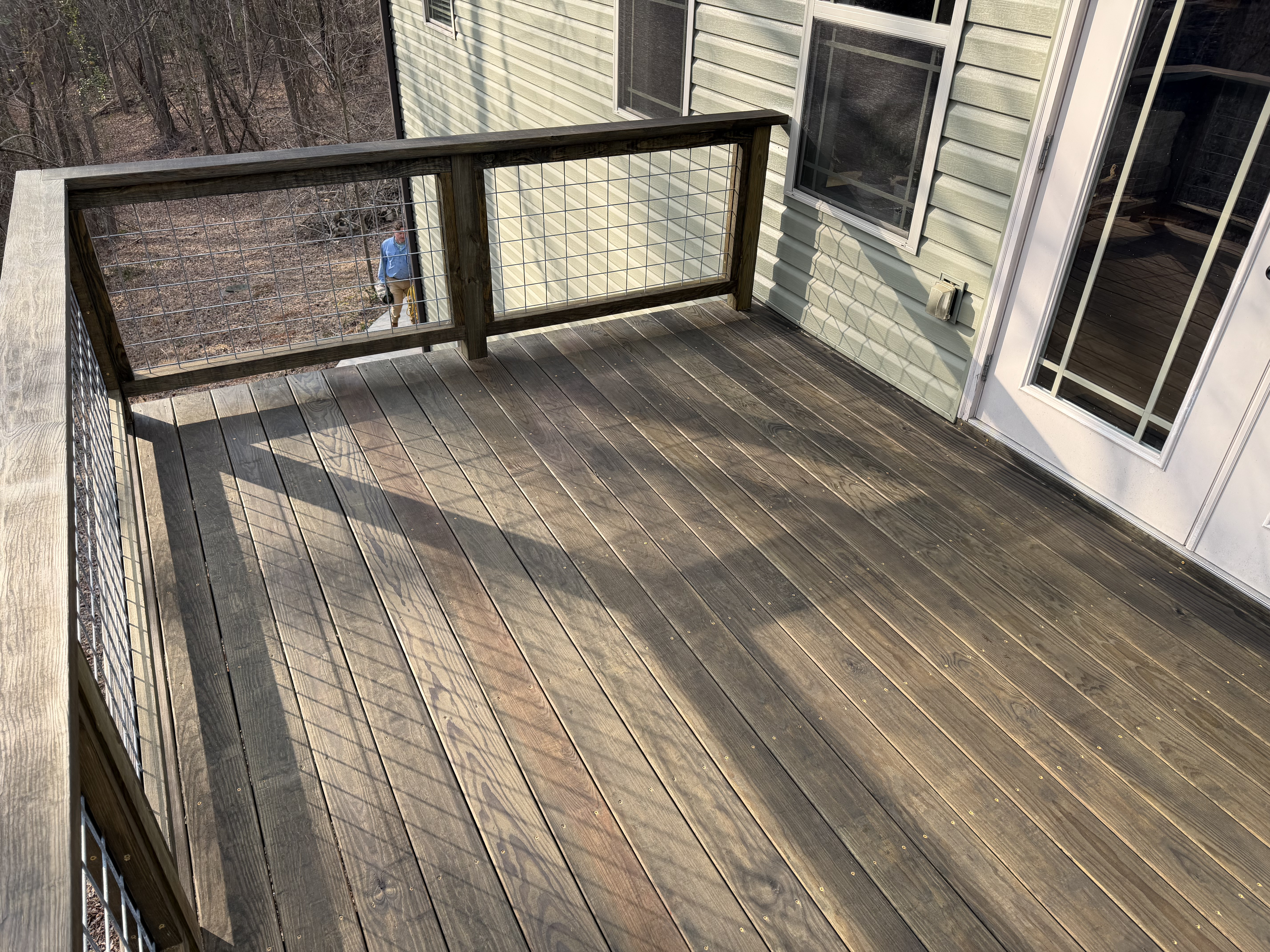 Finished Caleb deck beside the home after storm-related renovation in Berea