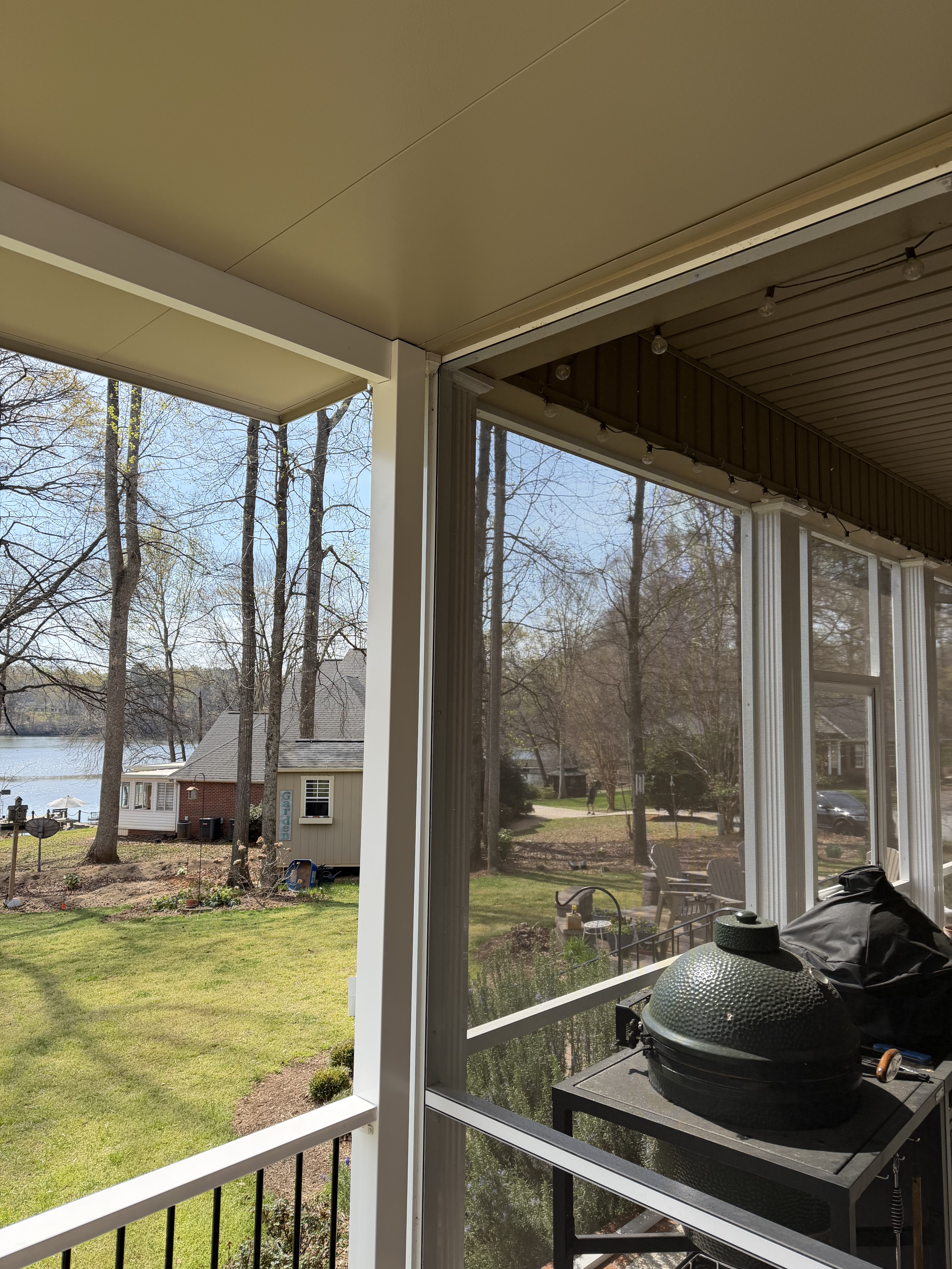 Transition between the existing screen porch and added covered grilling space in Duncan