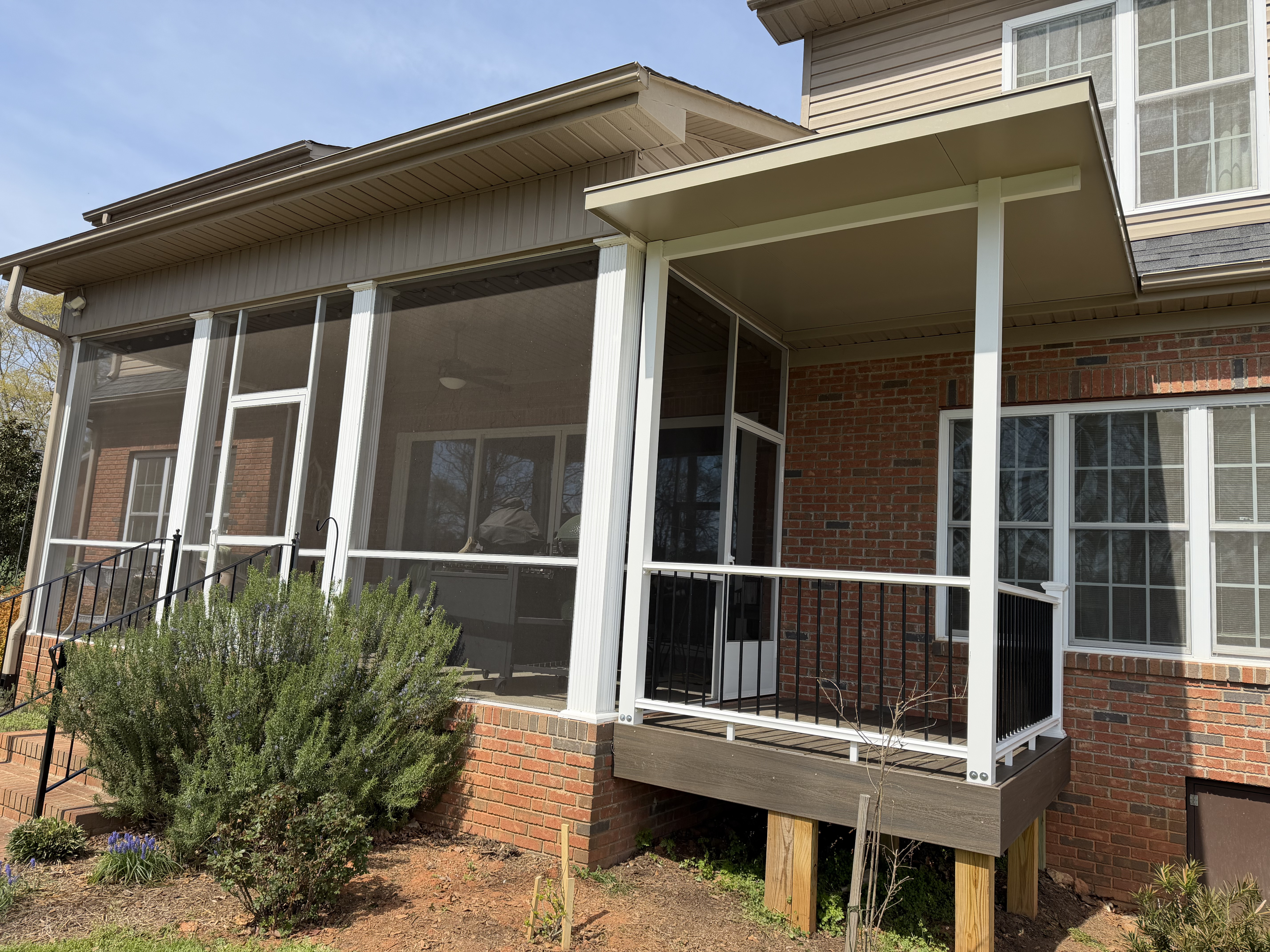 Covered grilling extension beside an existing screen porch in Duncan, South Carolina