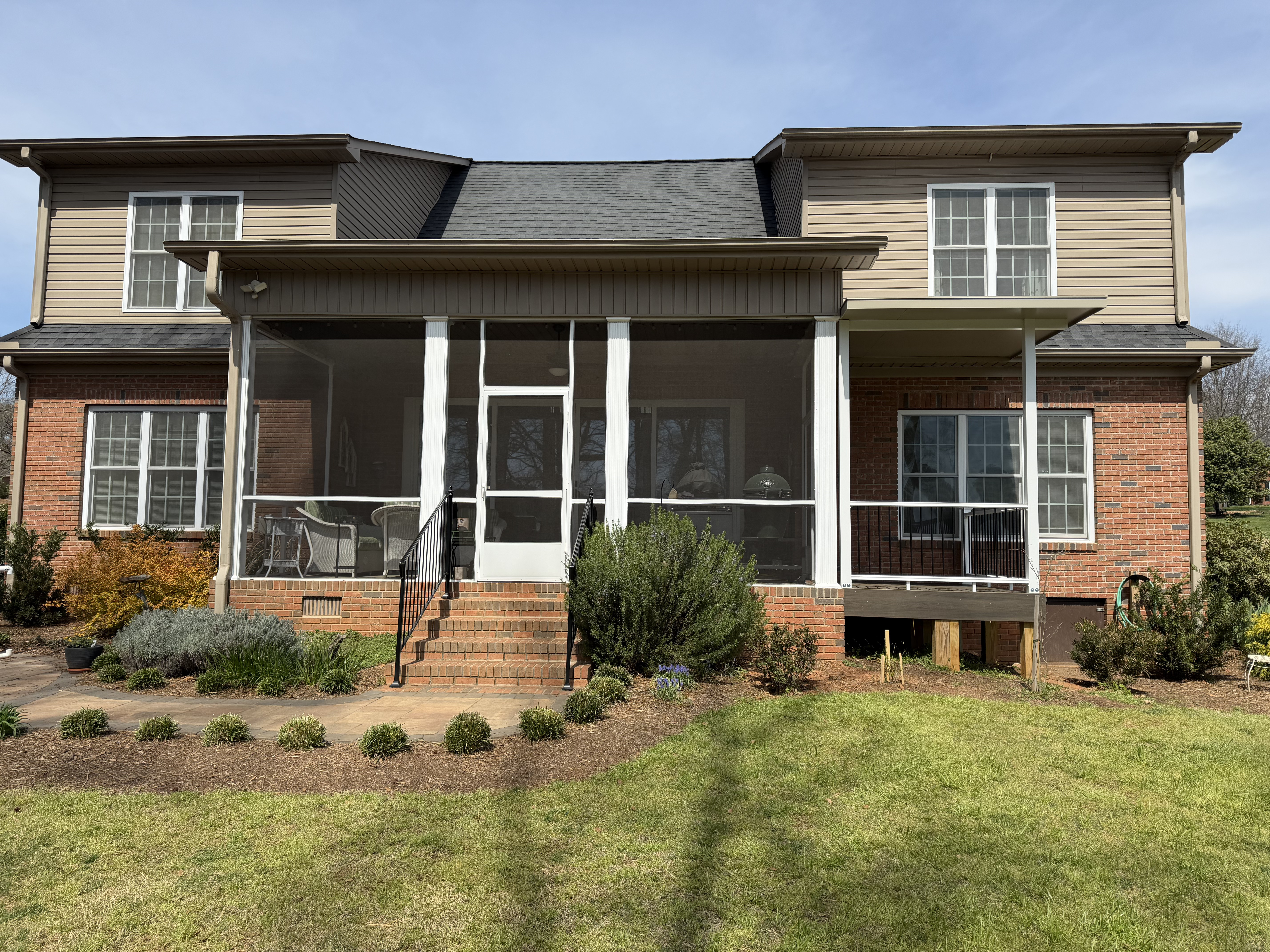 Covered porch extension beside an existing screen porch in Duncan, South Carolina