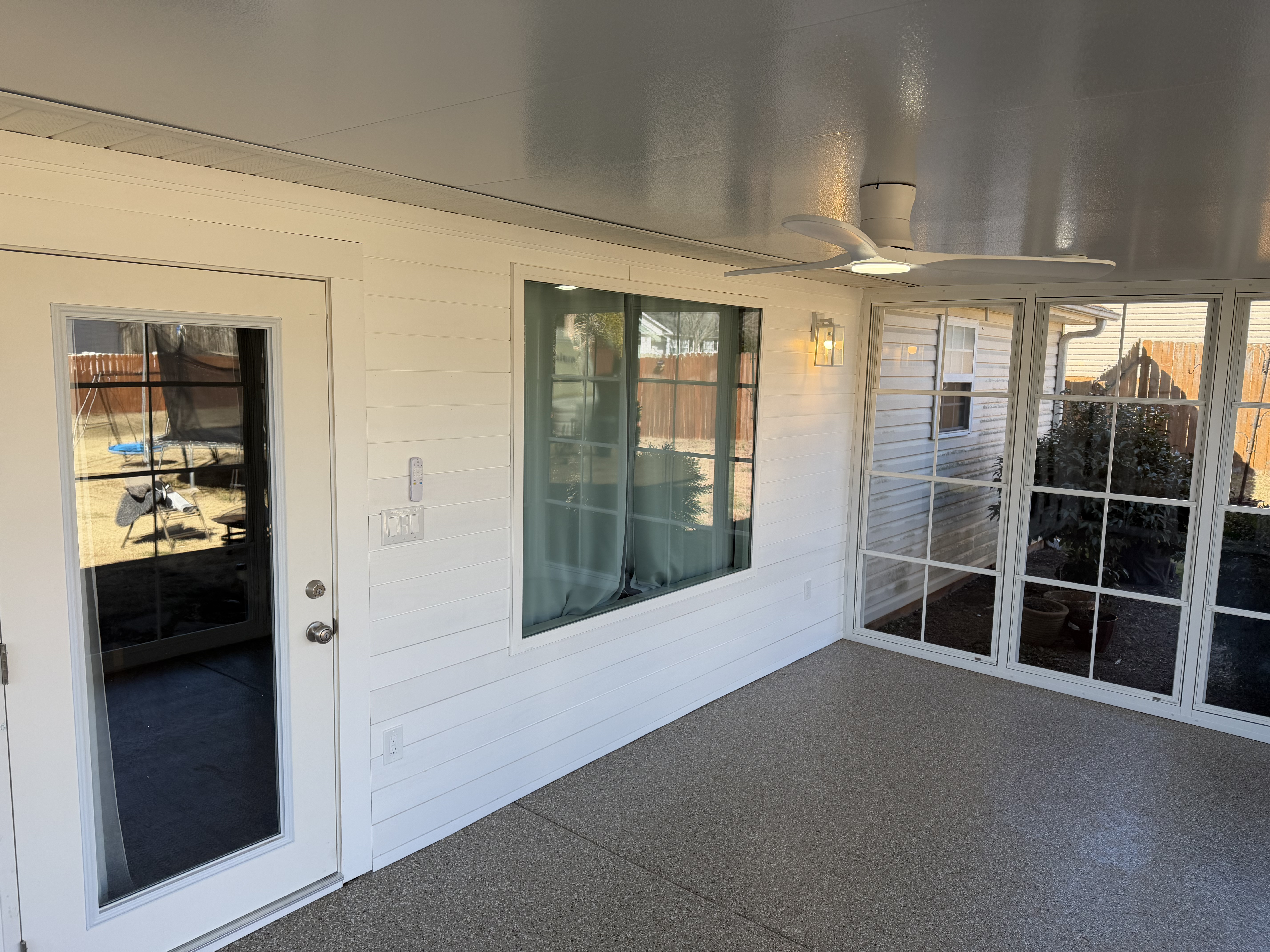 Finished wall, window, and interior details inside the Hill Eze-Breeze outdoor room