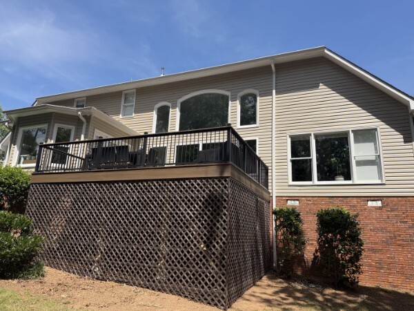 Completed composite deck with black railing at a Taylors, South Carolina home