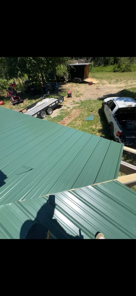 standing seam and corrugated metal roofing project by N2 Garcia's Construction LLC in Wister, OK