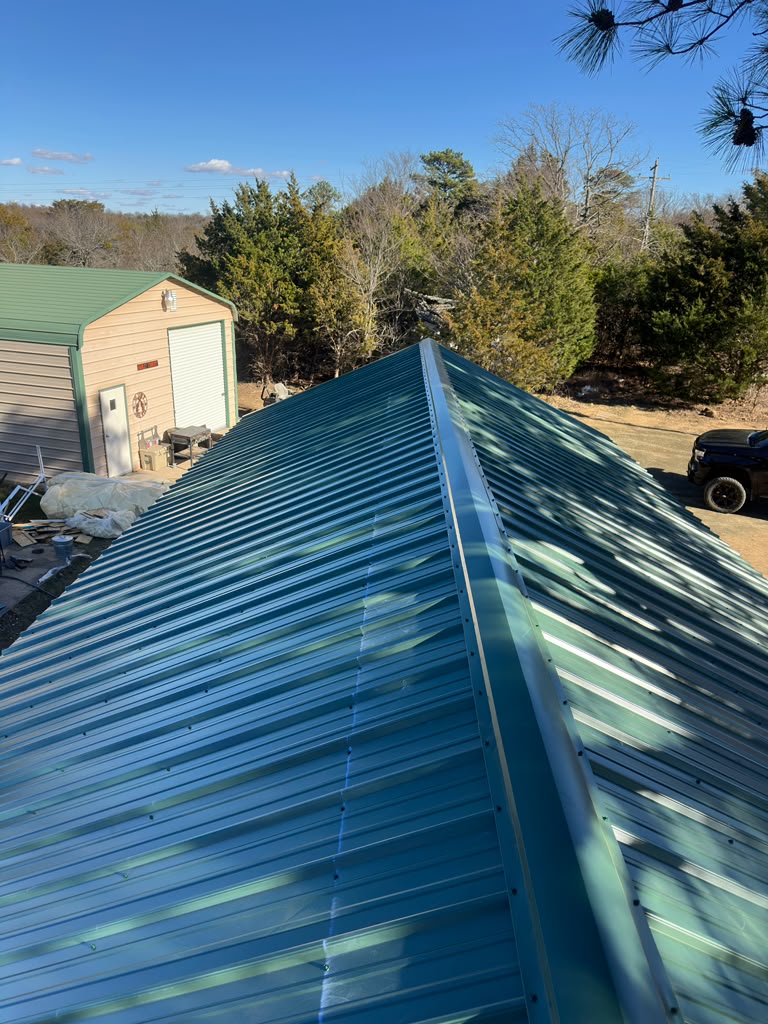 standing seam and corrugated metal roofing project by N2 Garcia's Construction LLC in Pocola, OK