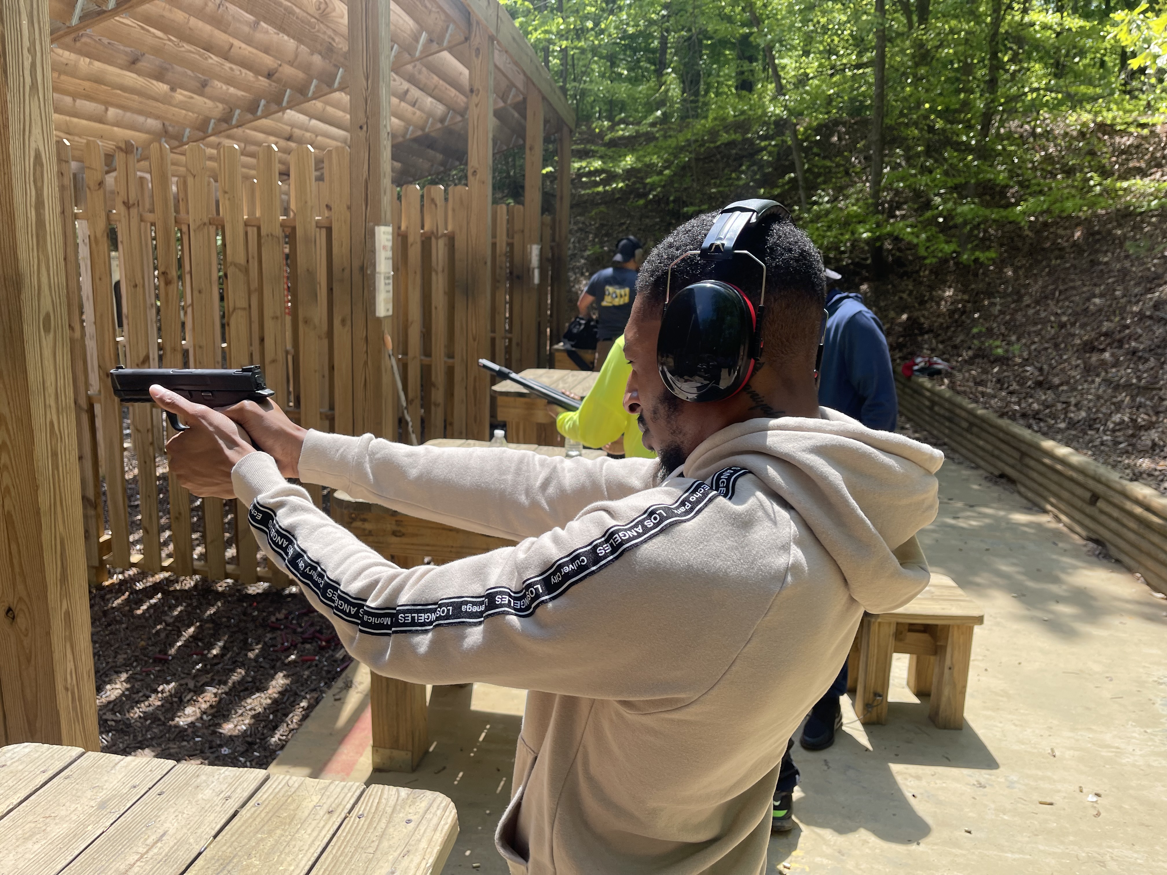 Student applying live-fire fundamentals during outdoor range training