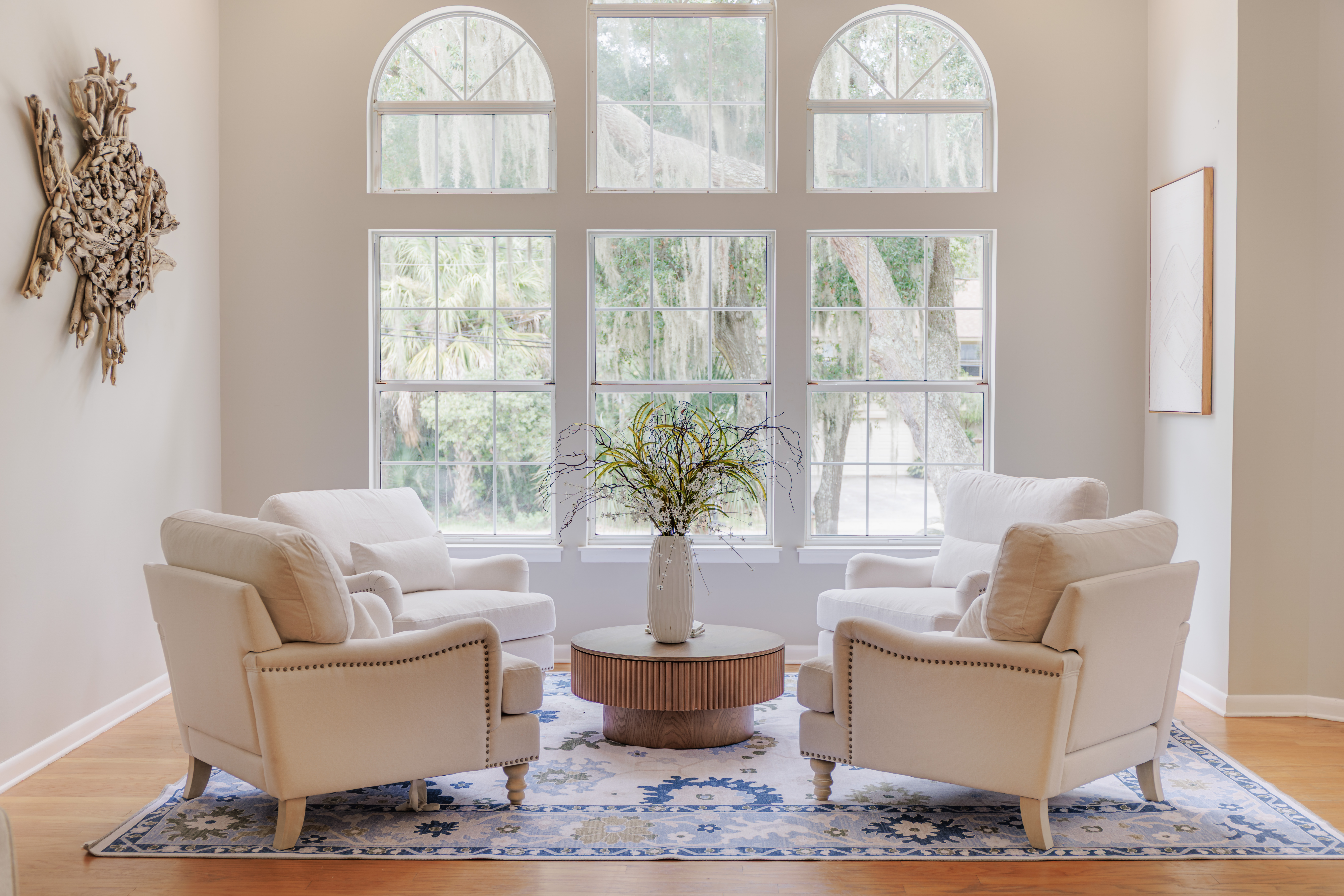 The Retreat at San Marco — styled vanity and mirror vignette with warm neutral accents in a Tybee Island vacation rental