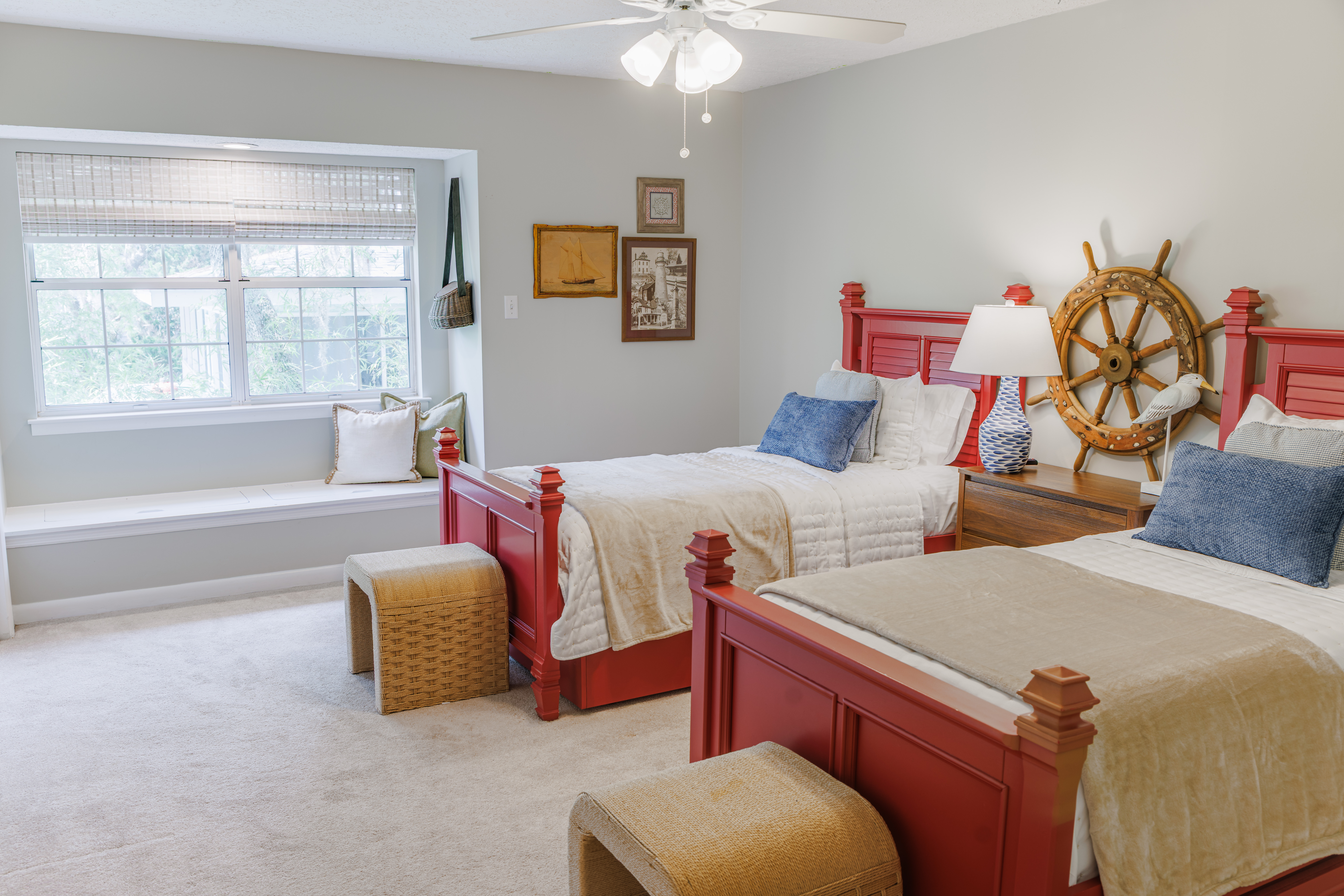 The Retreat at San Marco — entryway vignette with layered coastal décor, mirrors and warm neutral accents