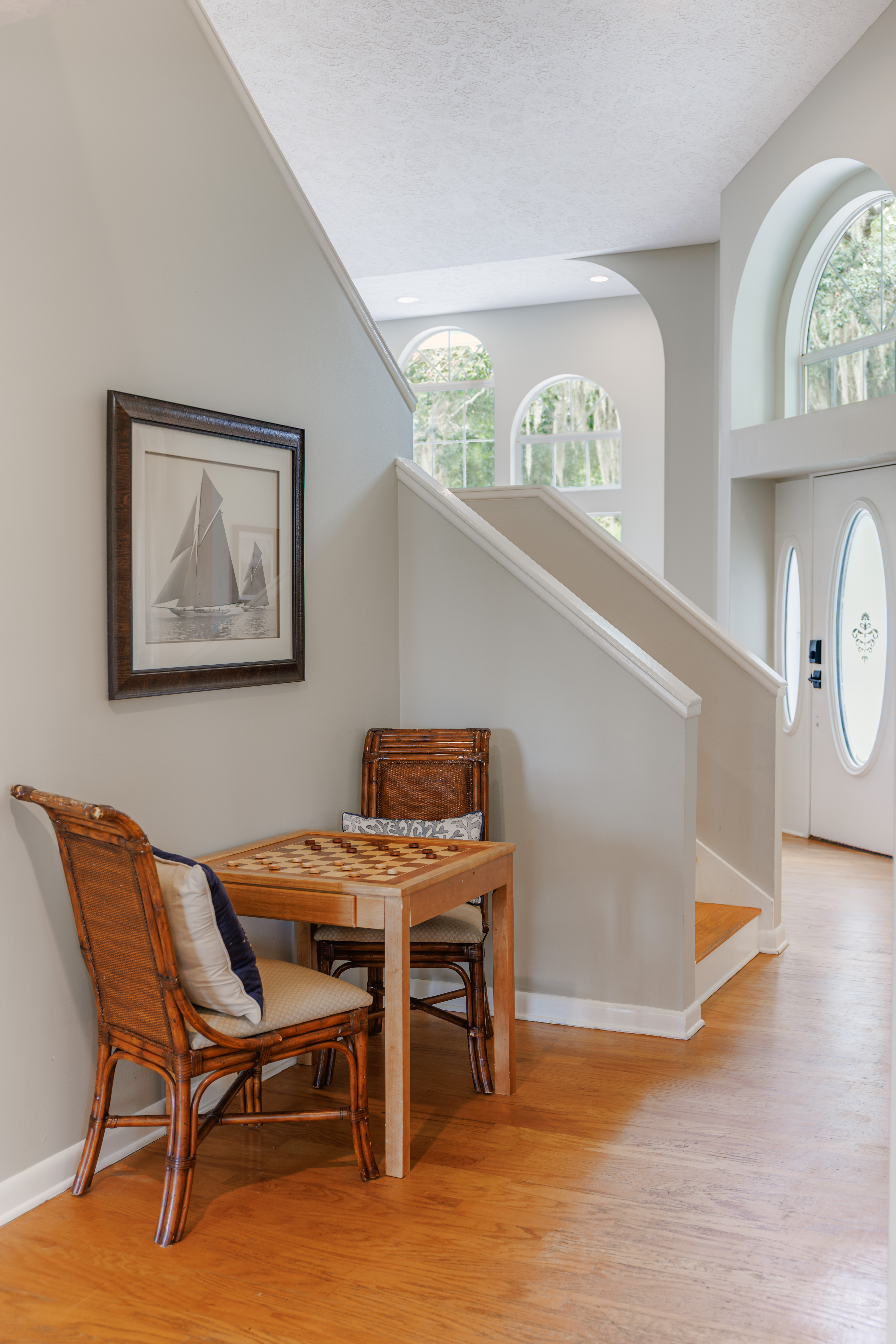 The Retreat at San Marco — bedroom styled with linen bedding, soft textiles and curated coastal décor