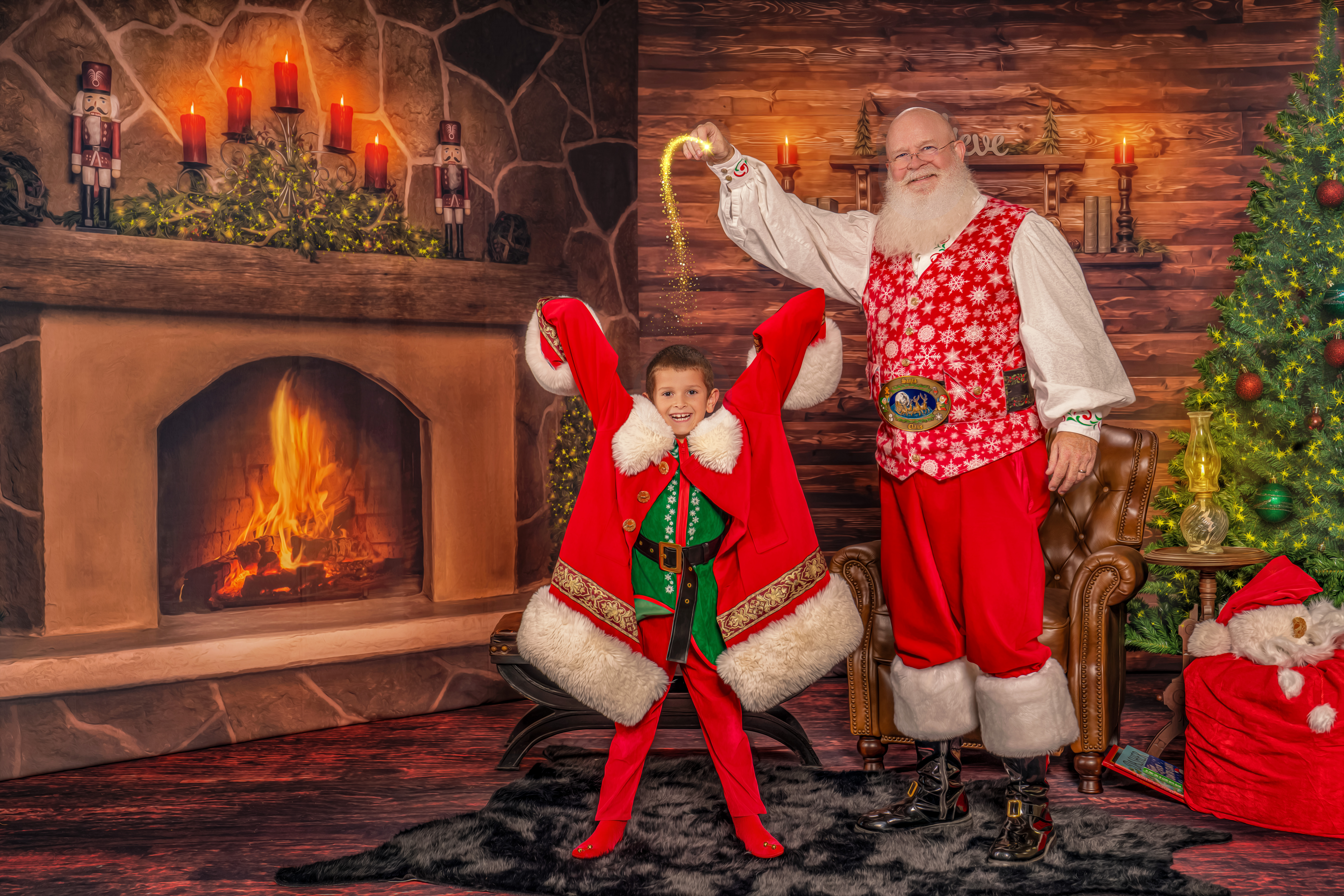 Jingle the Elf tries on Santa's coat with Santa's magic during The Magic of Santa