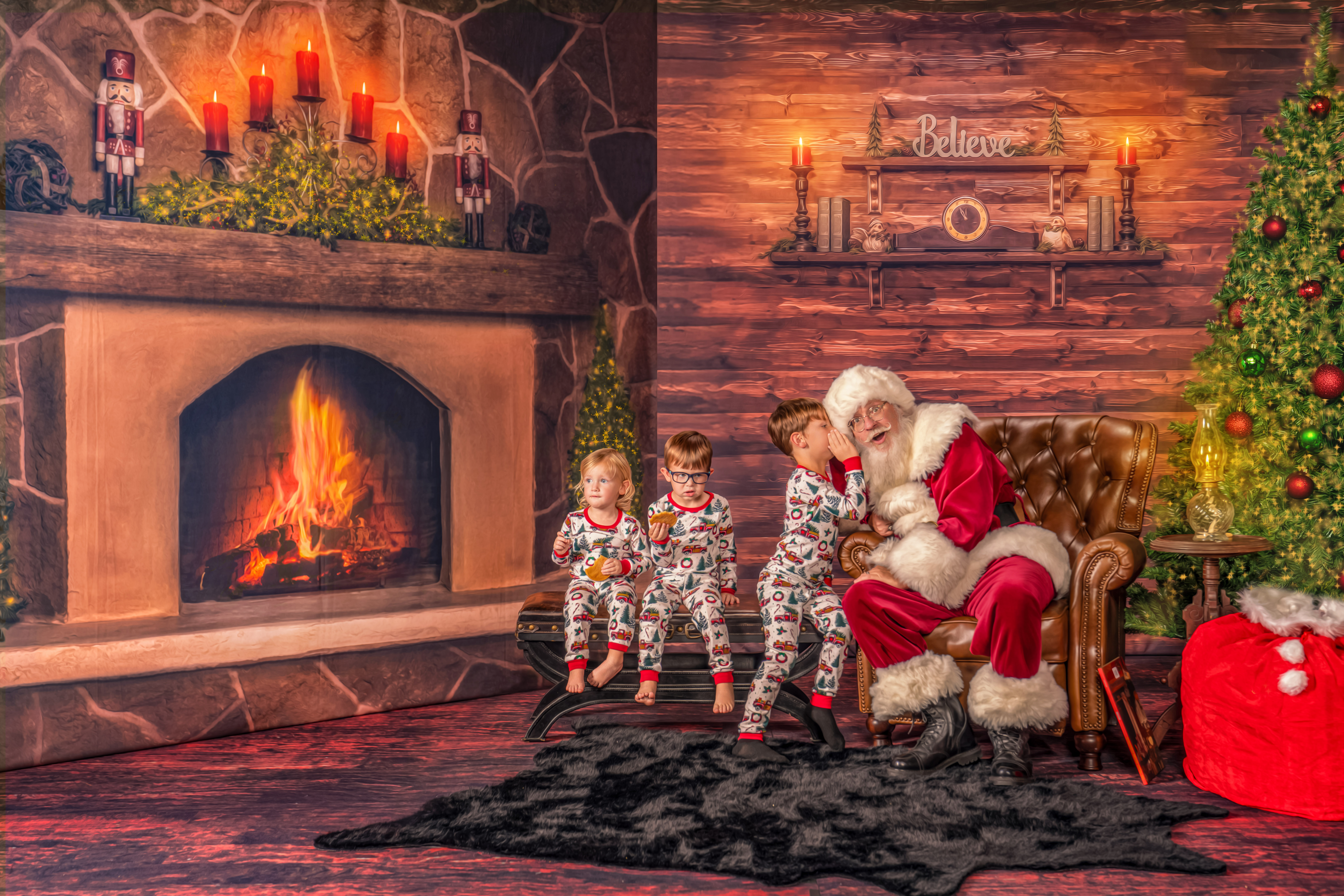 The children tell Santa Chris what they want for Christmas by whispering in his ear  during The Magic of Santa Christmas experience
