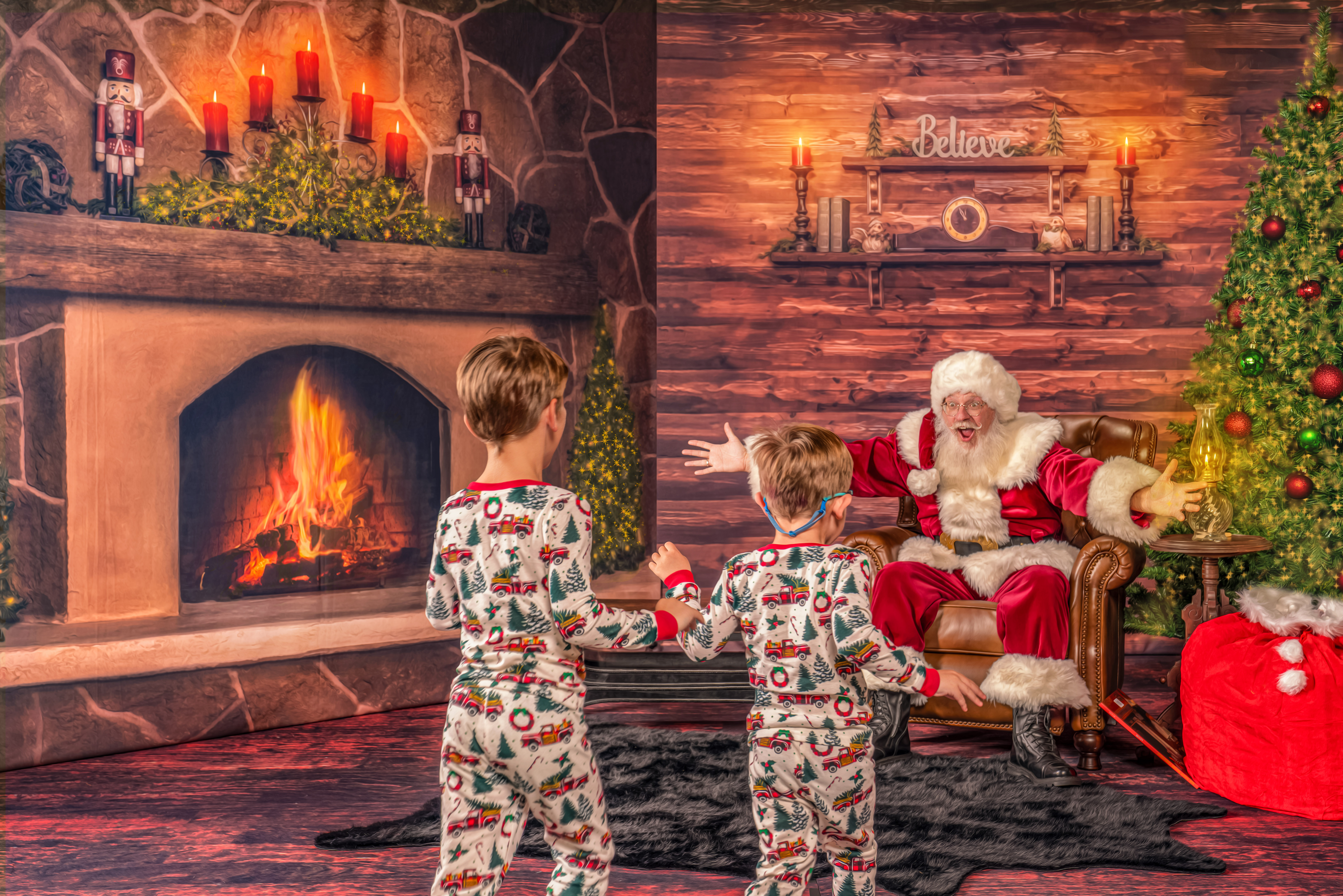 Santa Chris aits with his arms wide open for the children coming in for a great big hug during The Magic of Santa portrait experience