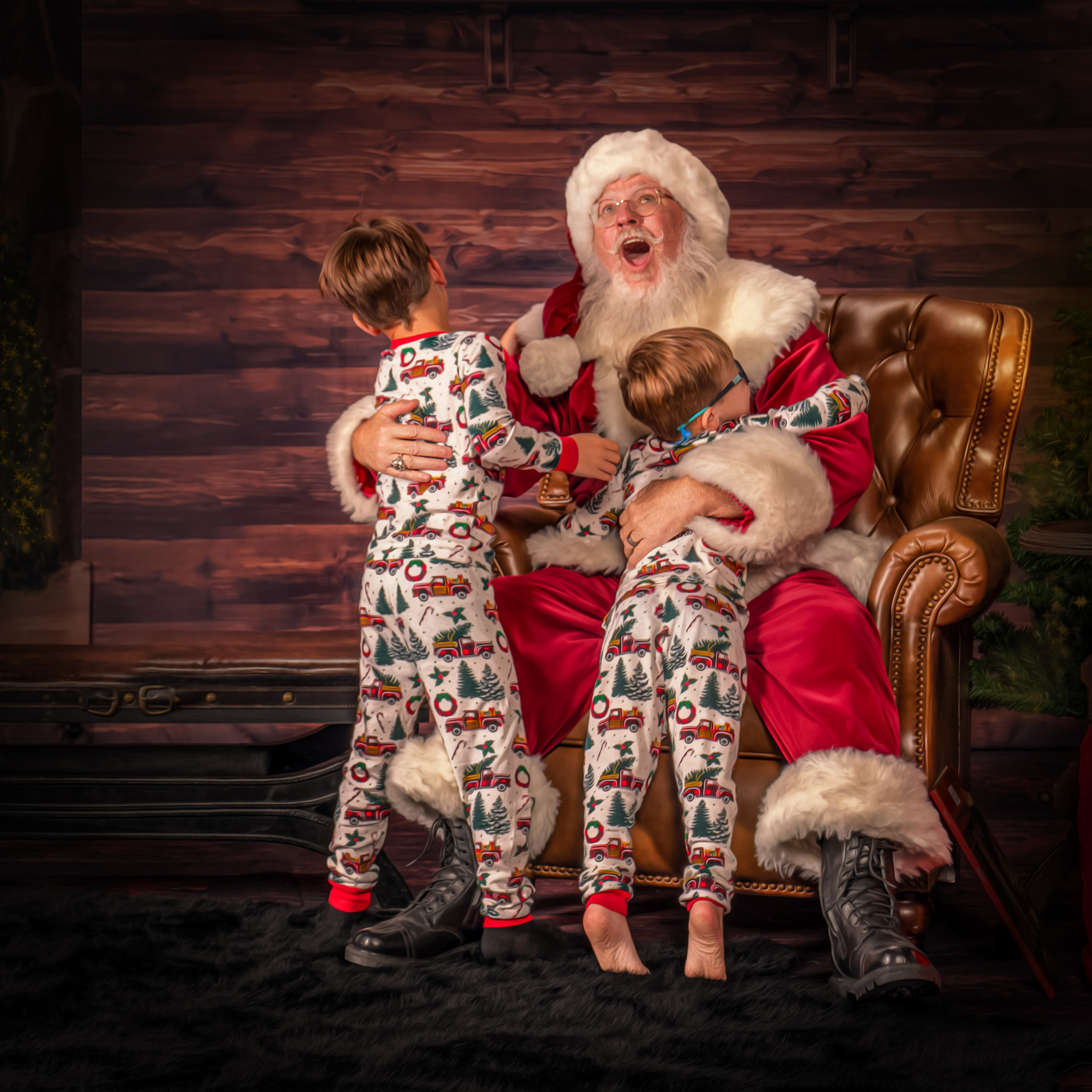 Santa Chris catching the children jumping into his arms during The Magic of Santa experience