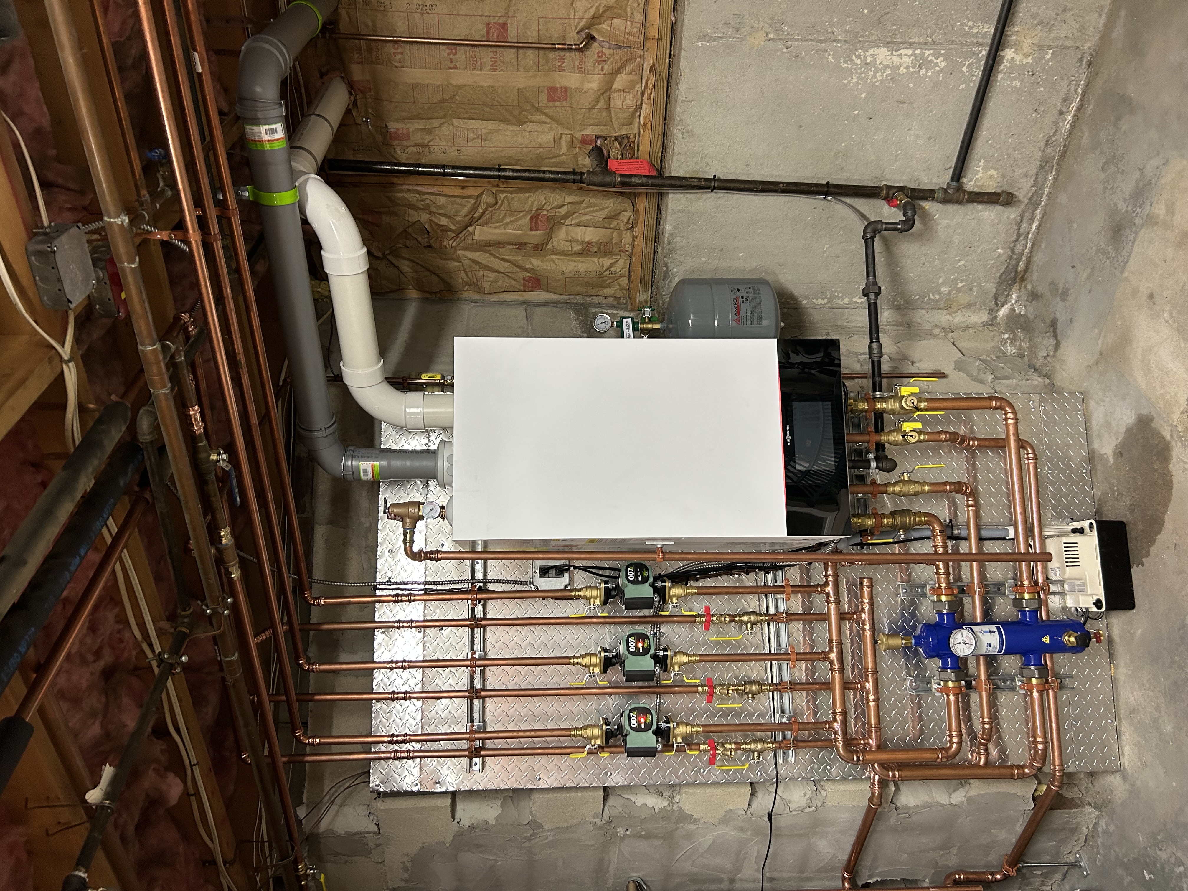 Mitsubishi Heat Pump installation in the South Shore by East Coast Air. Verified for $16k Mass Save Rebate.