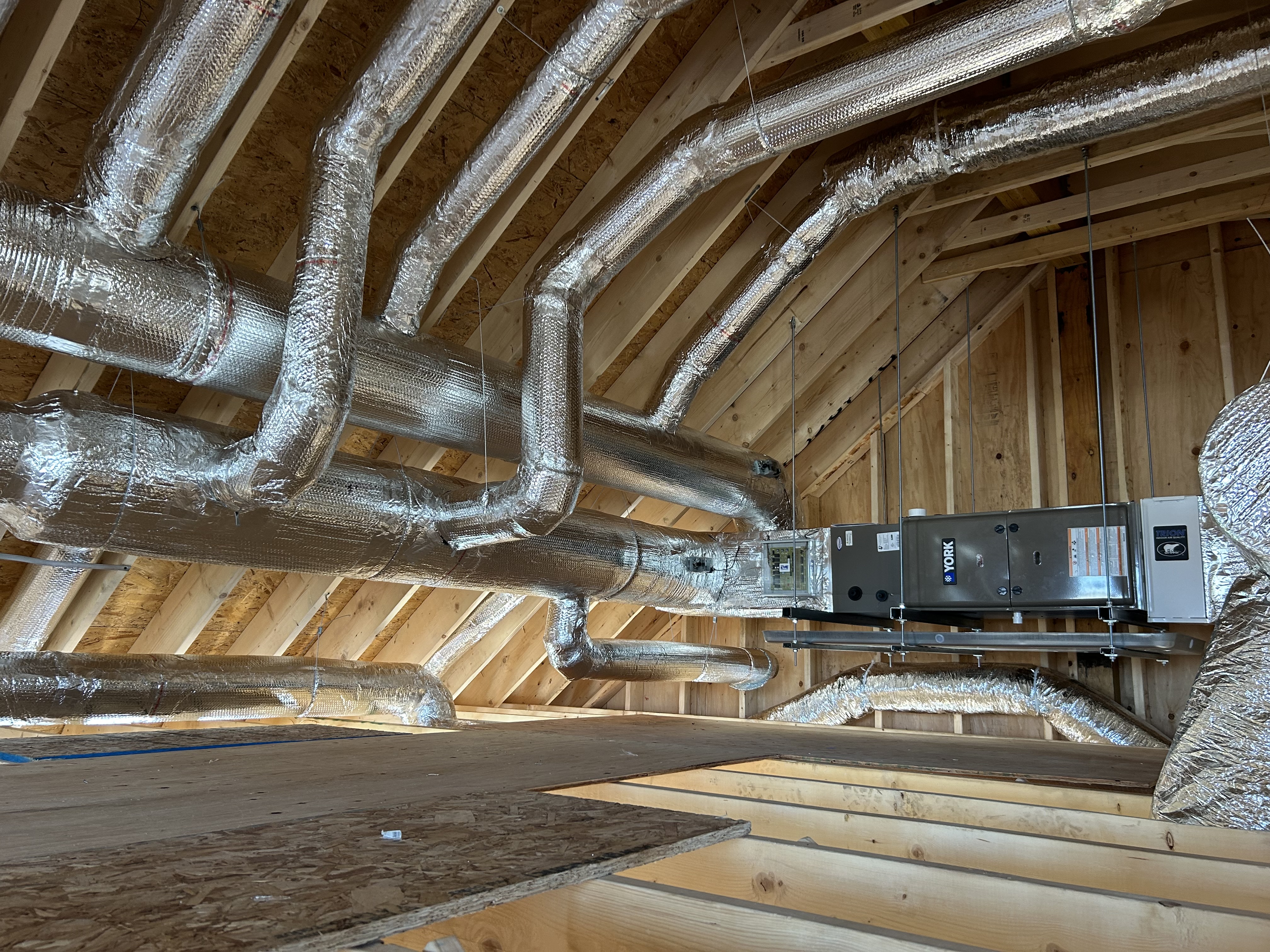 Mitsubishi Heat Pump installation in the South Shore by East Coast Air. Verified for $16k Mass Save Rebate.