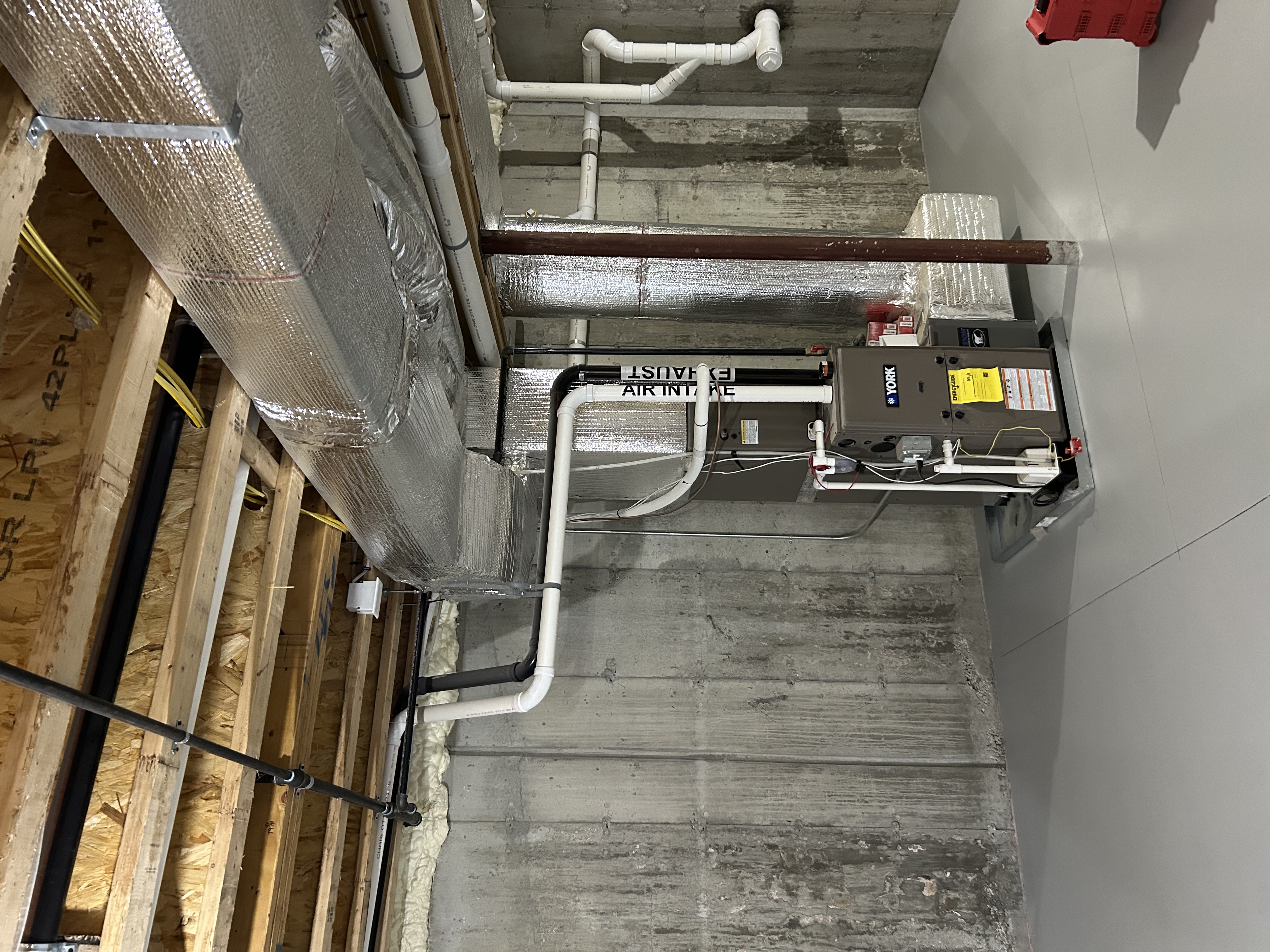 Mitsubishi Heat Pump installation in the South Shore by East Coast Air. Verified for $16k Mass Save Rebate.