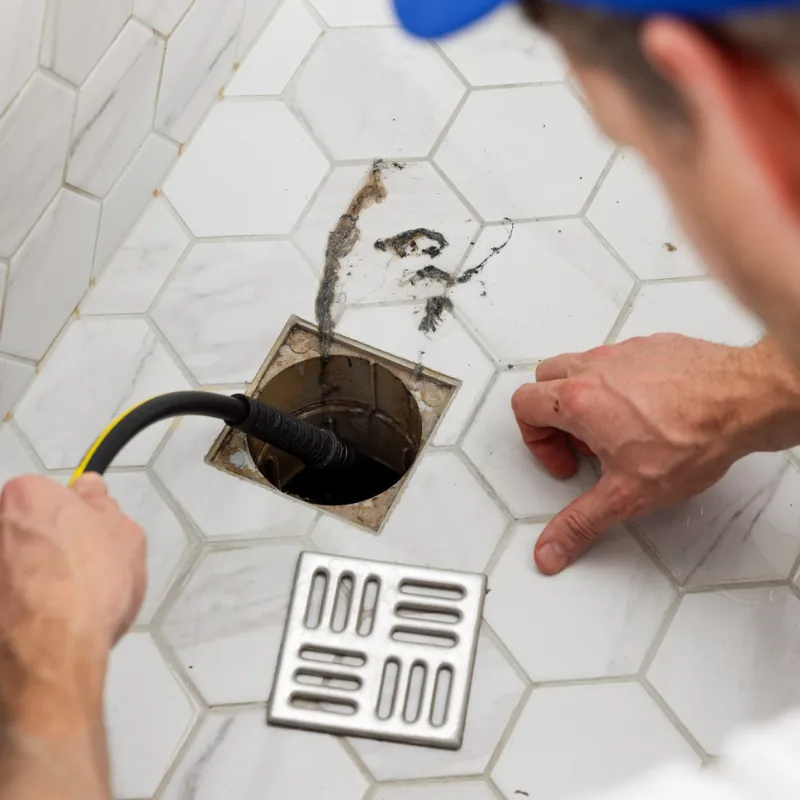 Camera inspection locating clogs in a Spanaway sewer line.