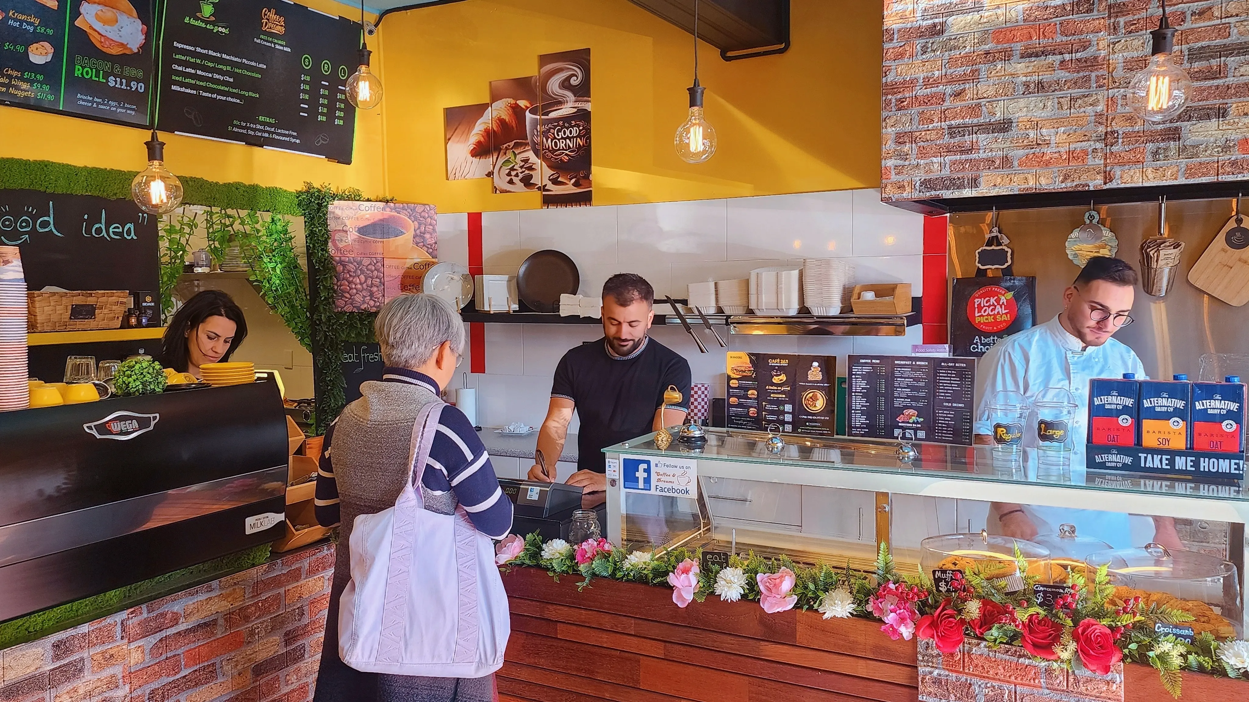 Inside Coffee and Dreams cafe on Gouger Street Adelaide CBD - warm interior with coffee and breakfast