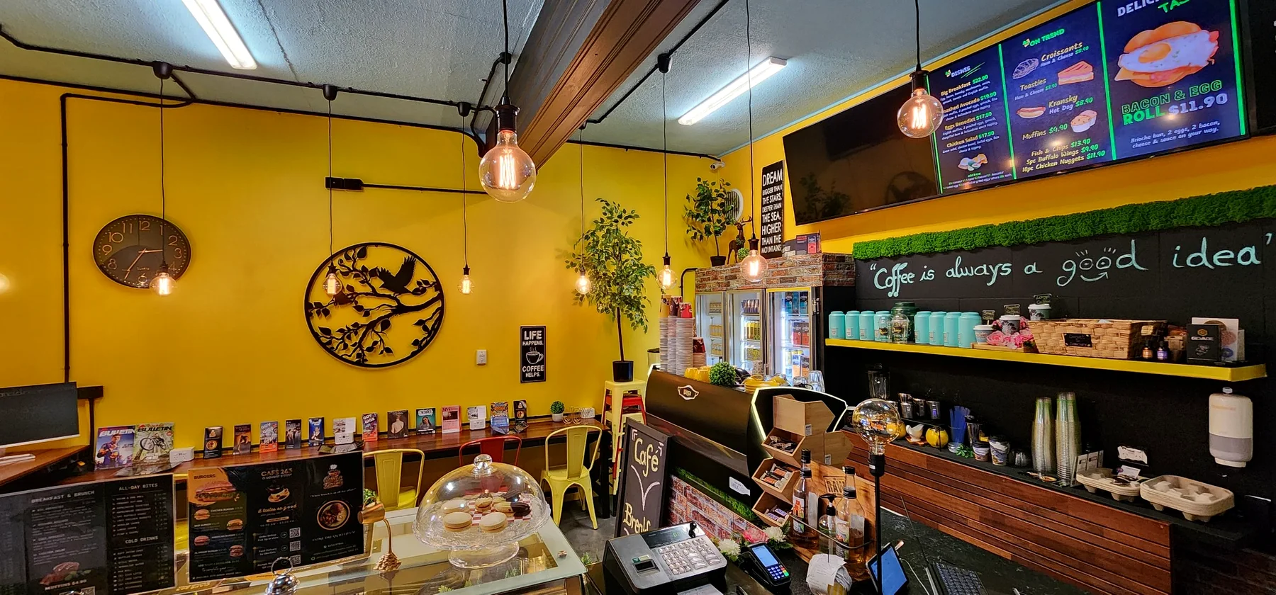Staff serving fresh food at Coffee & Dreams in Adelaide CBD.