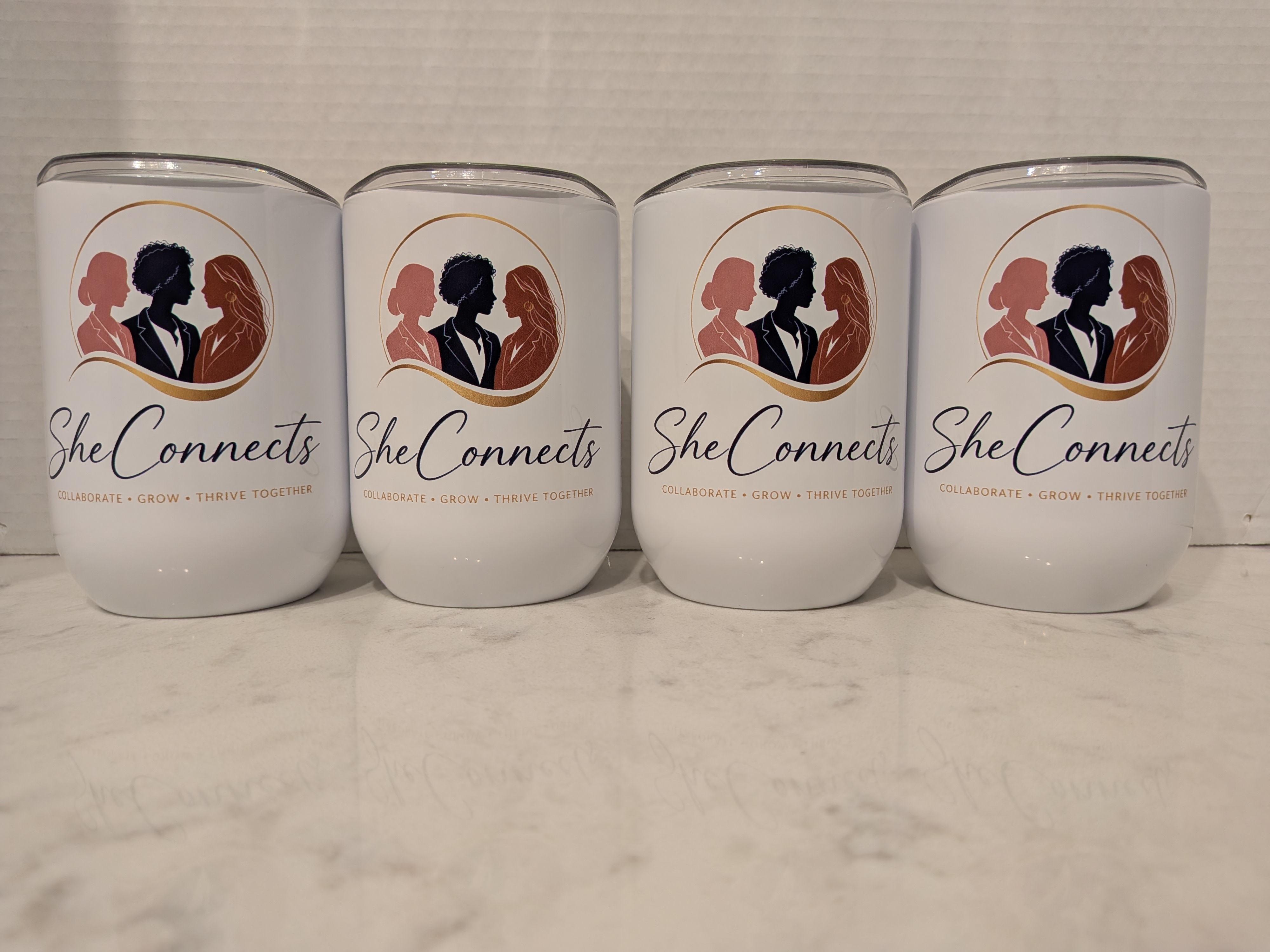 Custom printed She Connects tumblers
