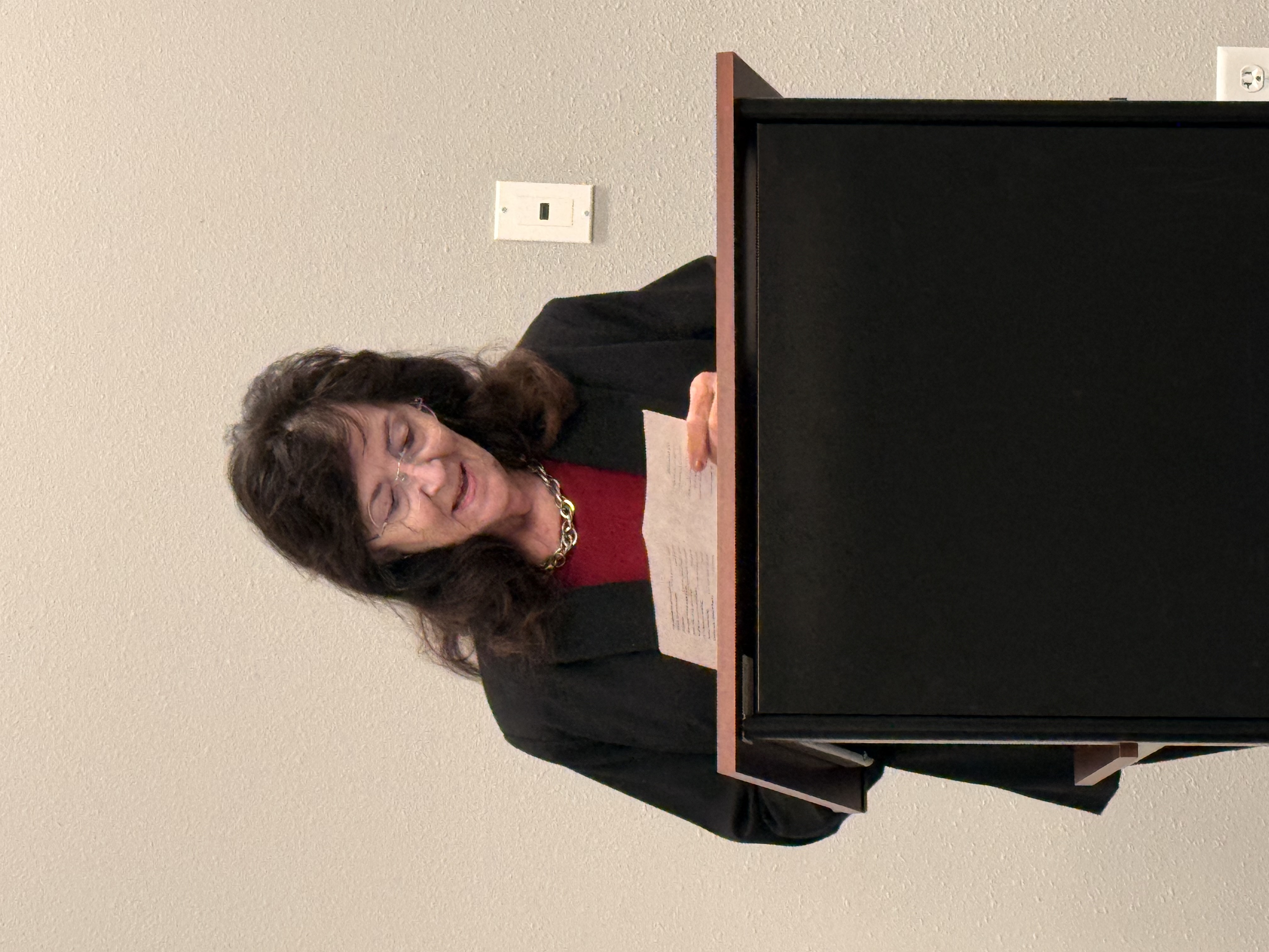 Dr. Gulley's mother, a poet herself reads one of her grandson's poems. Dr. Gulley's mother, a poet herself reads one of her grandson's poems.
