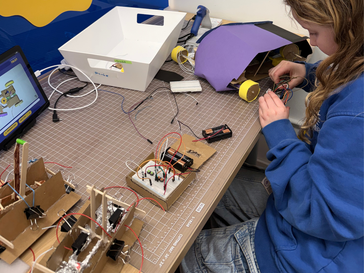 Steamoji Kelowna students working on an engineering project