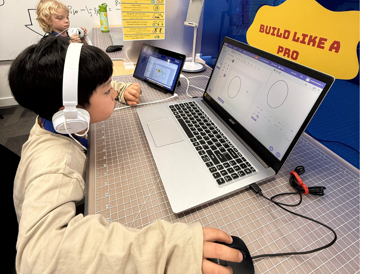 Steamoji Kelowna students working on AI storytelling