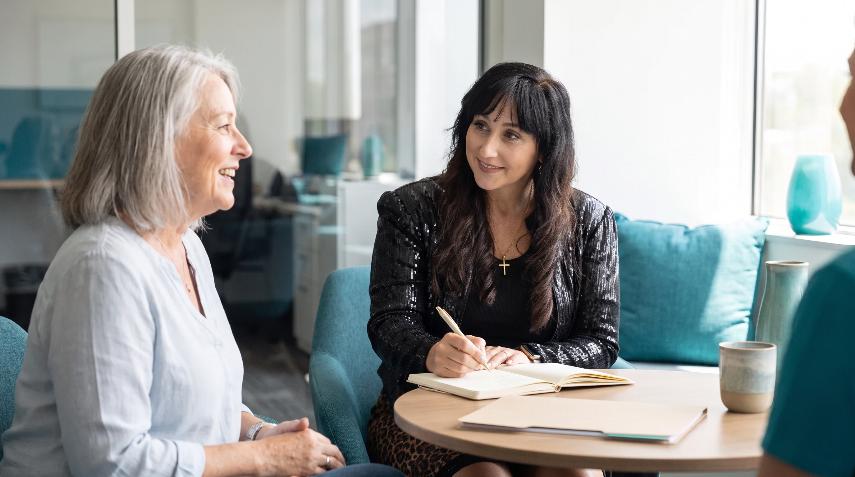 Financial professional reviewing retirement income information with a client.