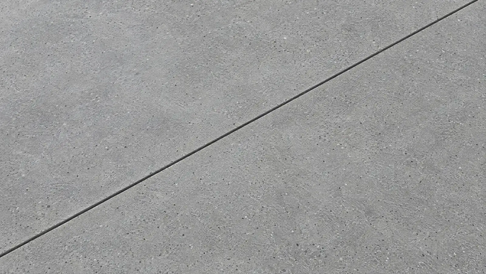 Paver patio with segmental block retaining wall