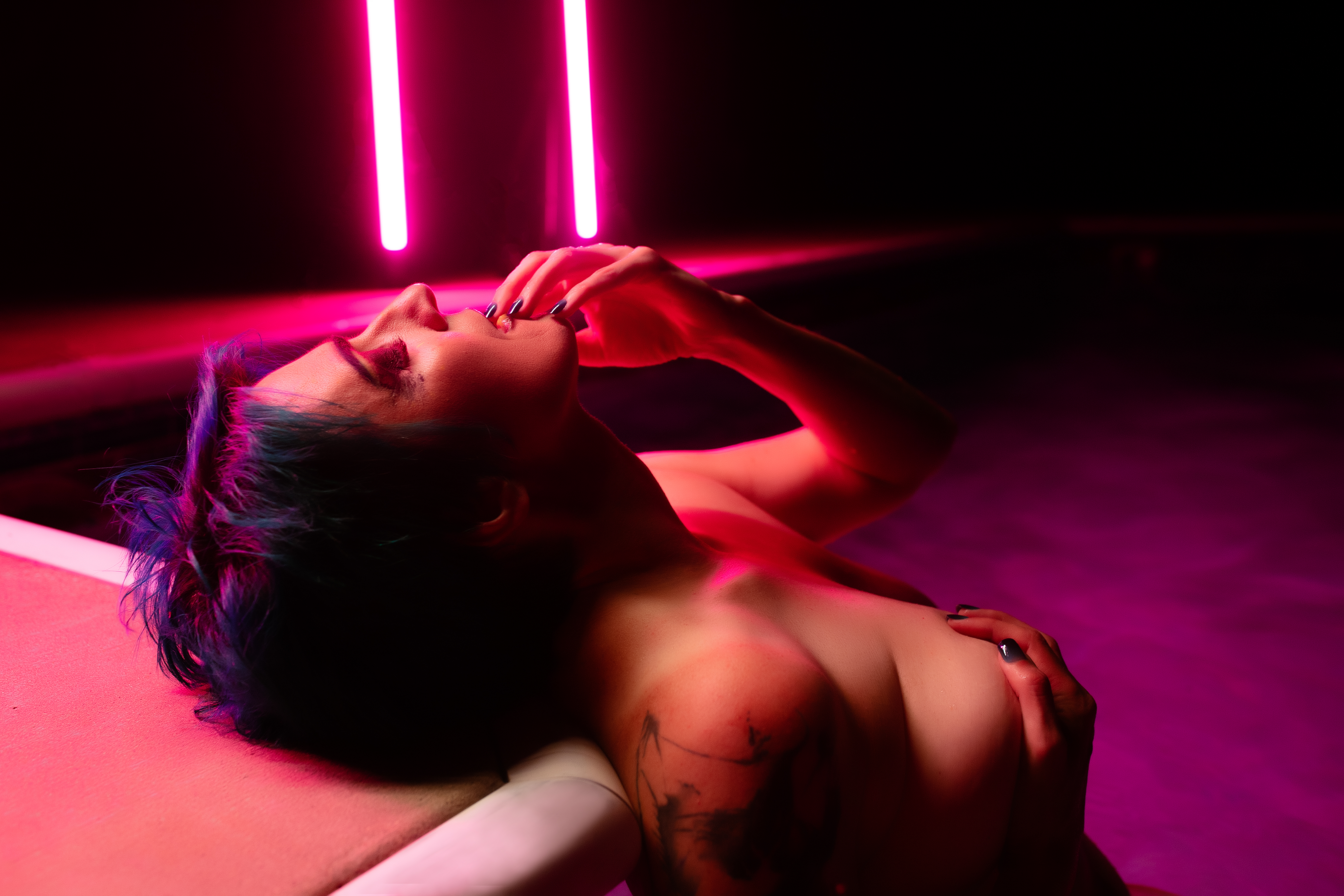 Pool boudoir studio environment with moody reflections and cinematic lighting