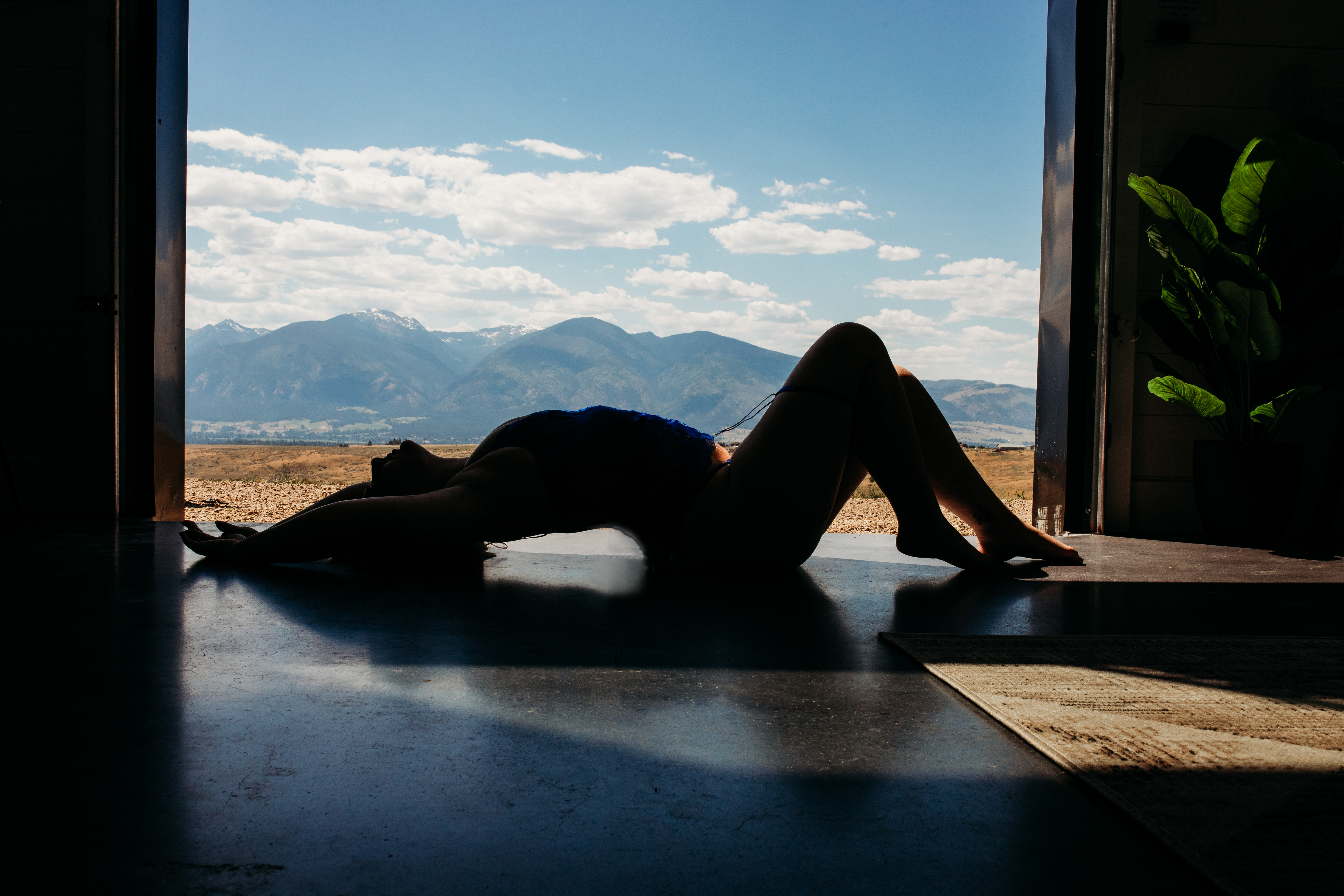 Destination-inspired boudoir studio environment with warm resort lighting