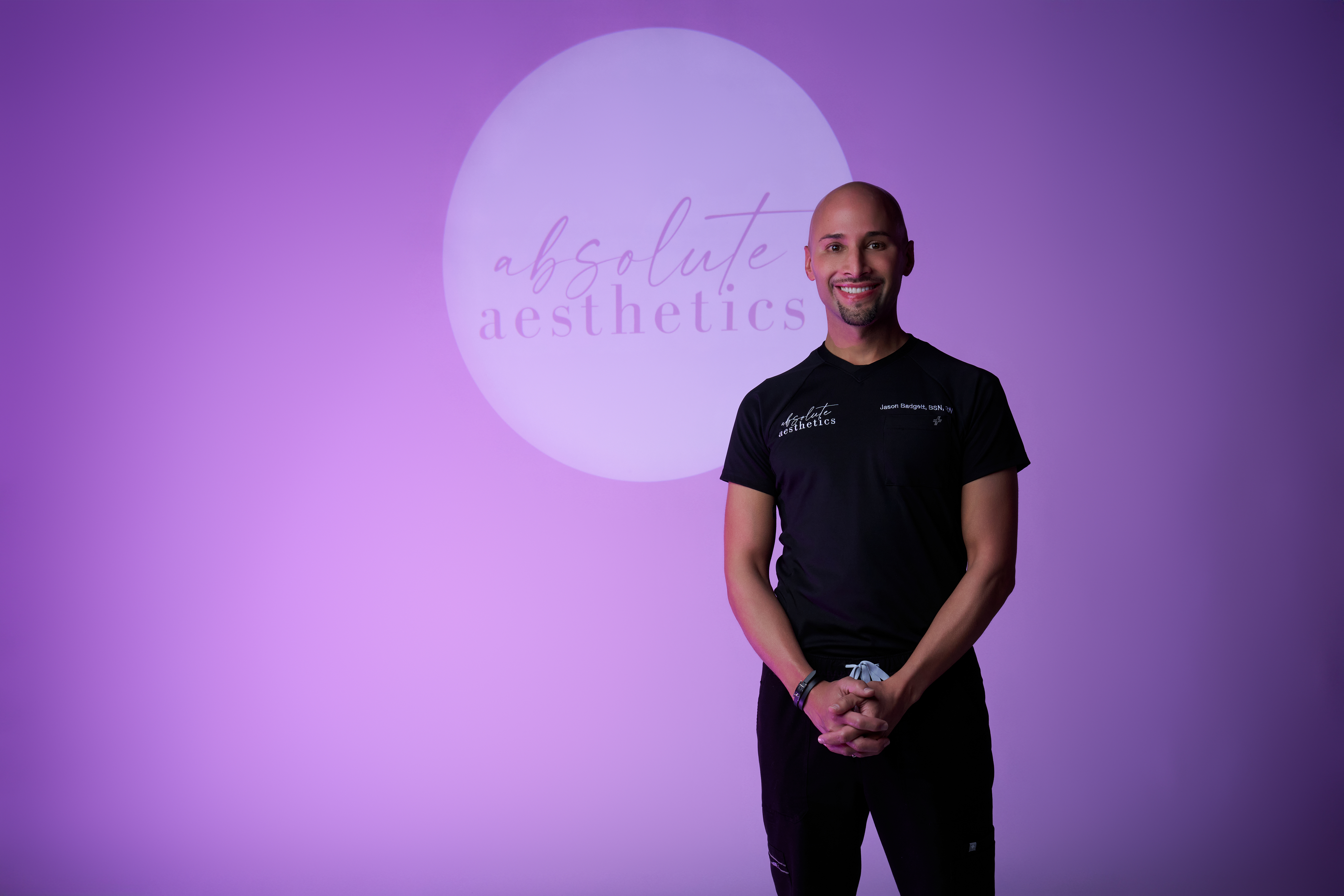 Clean, professional medical spa treatment room with neutral tones at Absolute Aesthetics in Denison