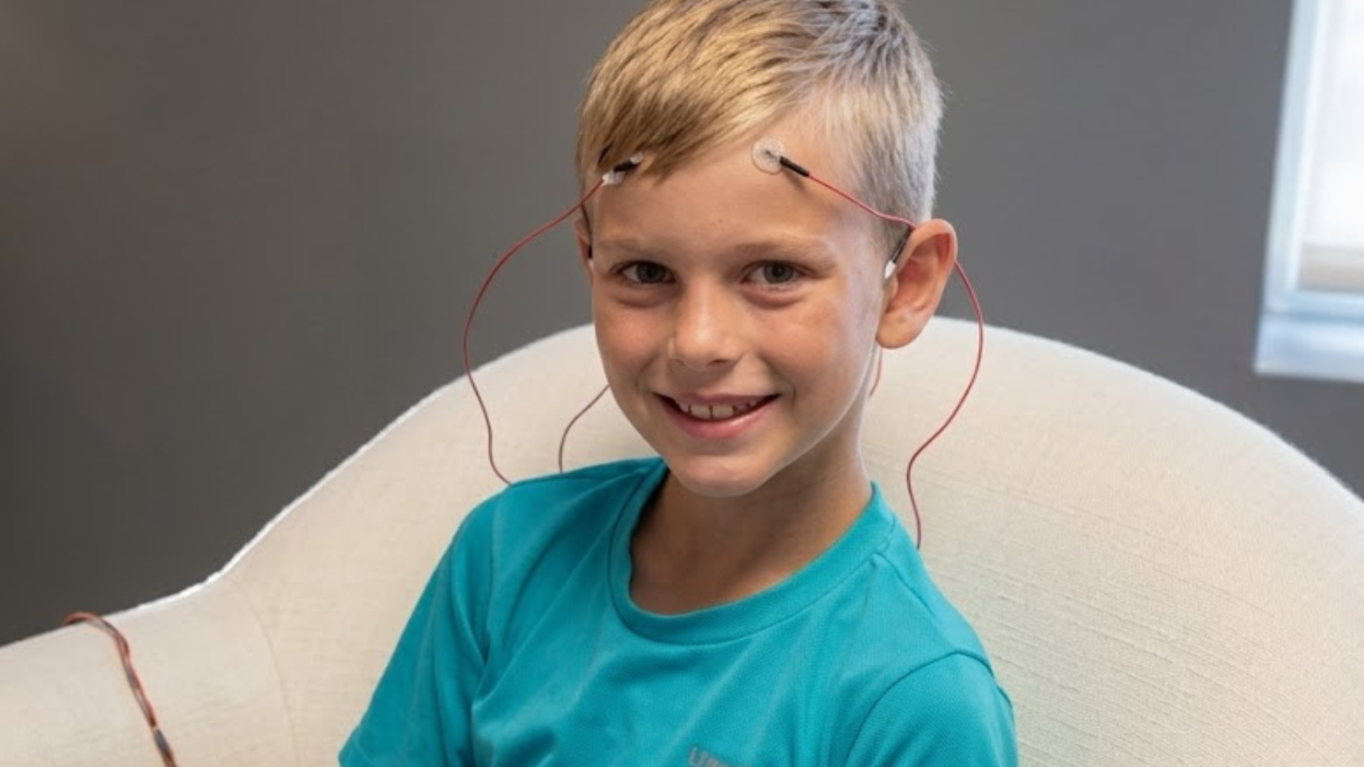 Child relaxing during Microcurrent Neurofeedback