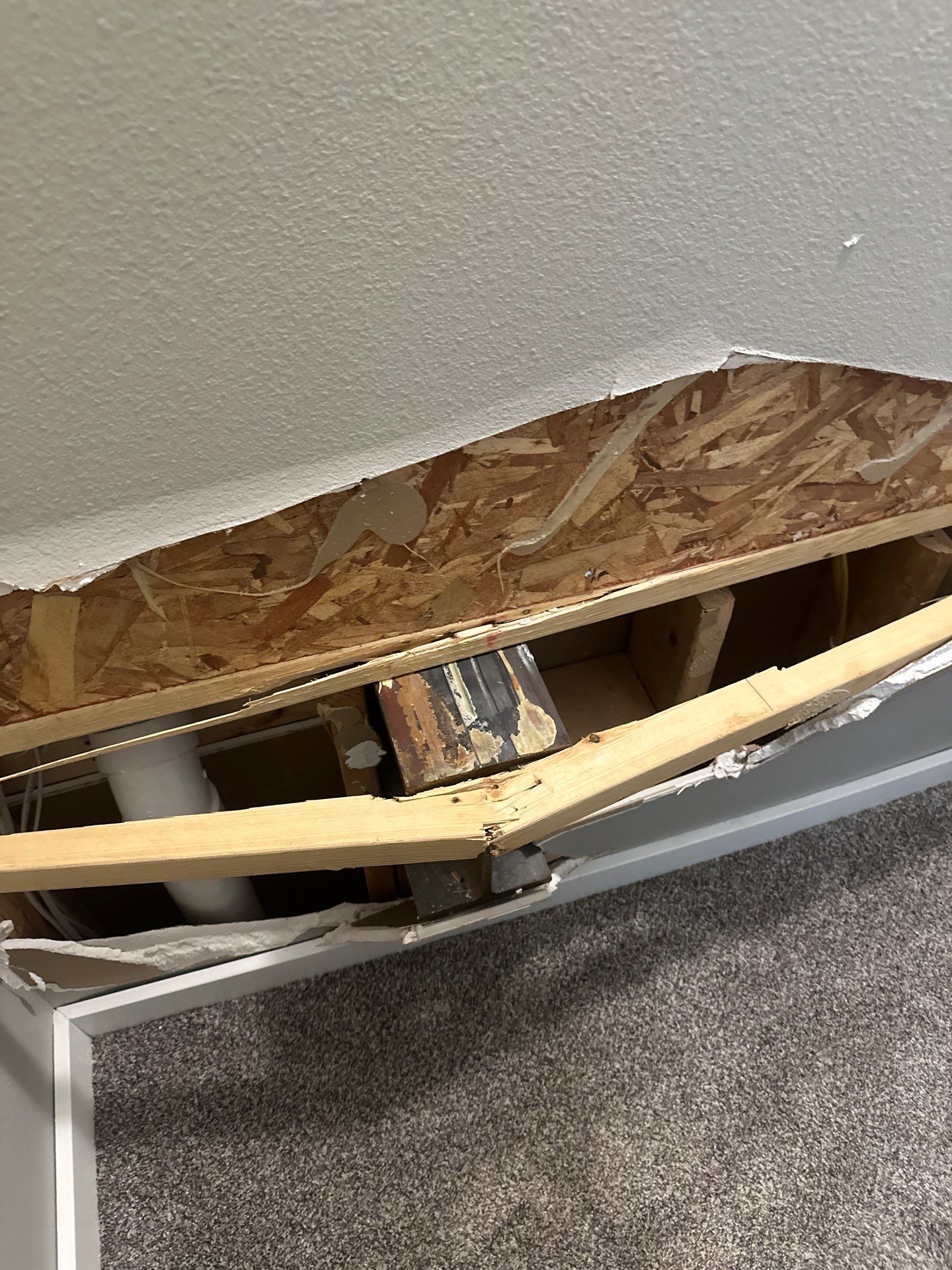 beam forced through the wall